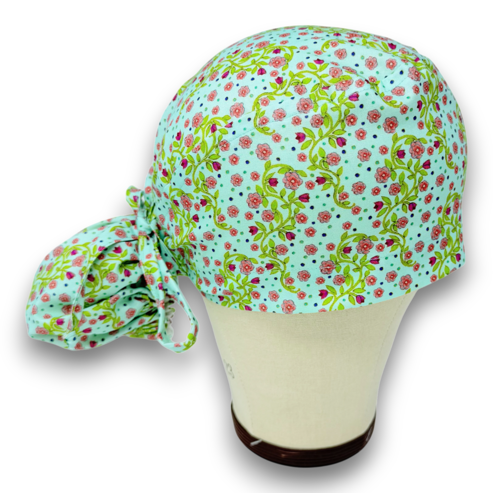 Pink flower Ponytail scrub cap for women with satin lined option by Paradise Caps.
