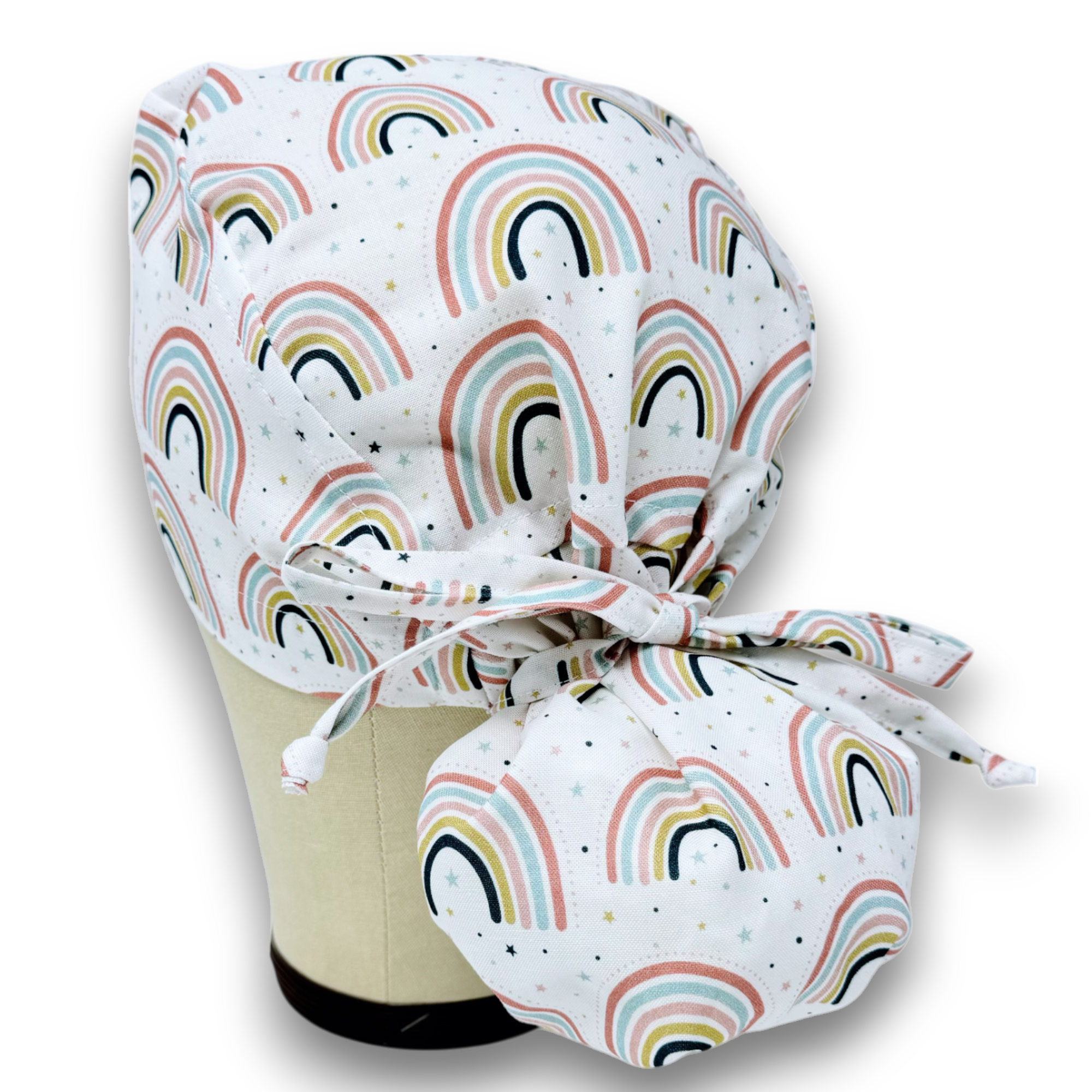 Cute Rainbow Ponytail scrub cap for women with satin lined option by Paradise Caps.