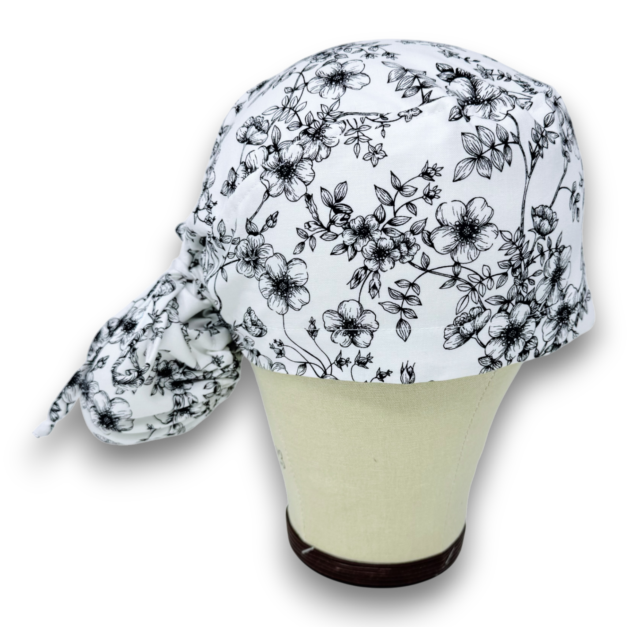 Floral Ponytail scrub cap for women with satin lined option by Paradise Caps.
