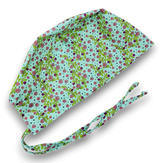 Pink flower skull tie-back style surgical scrub cap by Paradise Caps.