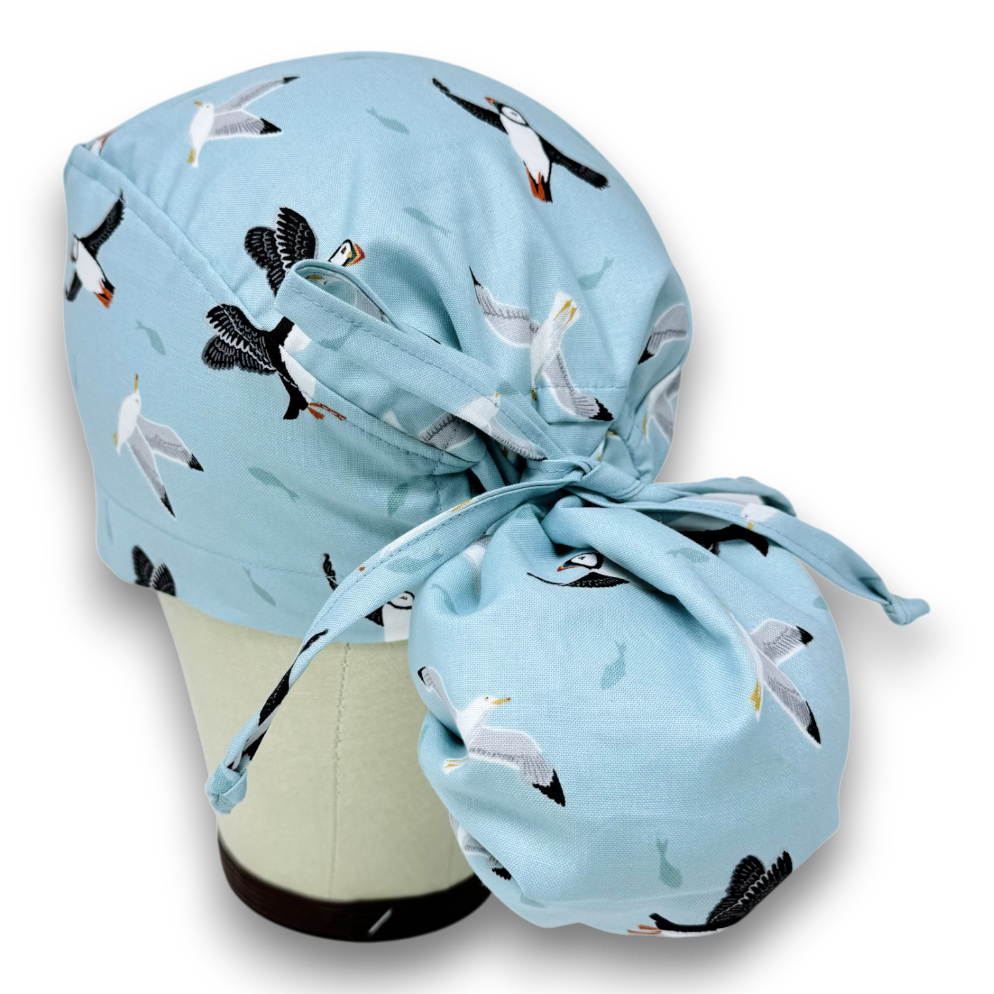 Puffin Ponytail scrub cap for women with satin lined option by Paradise Caps.