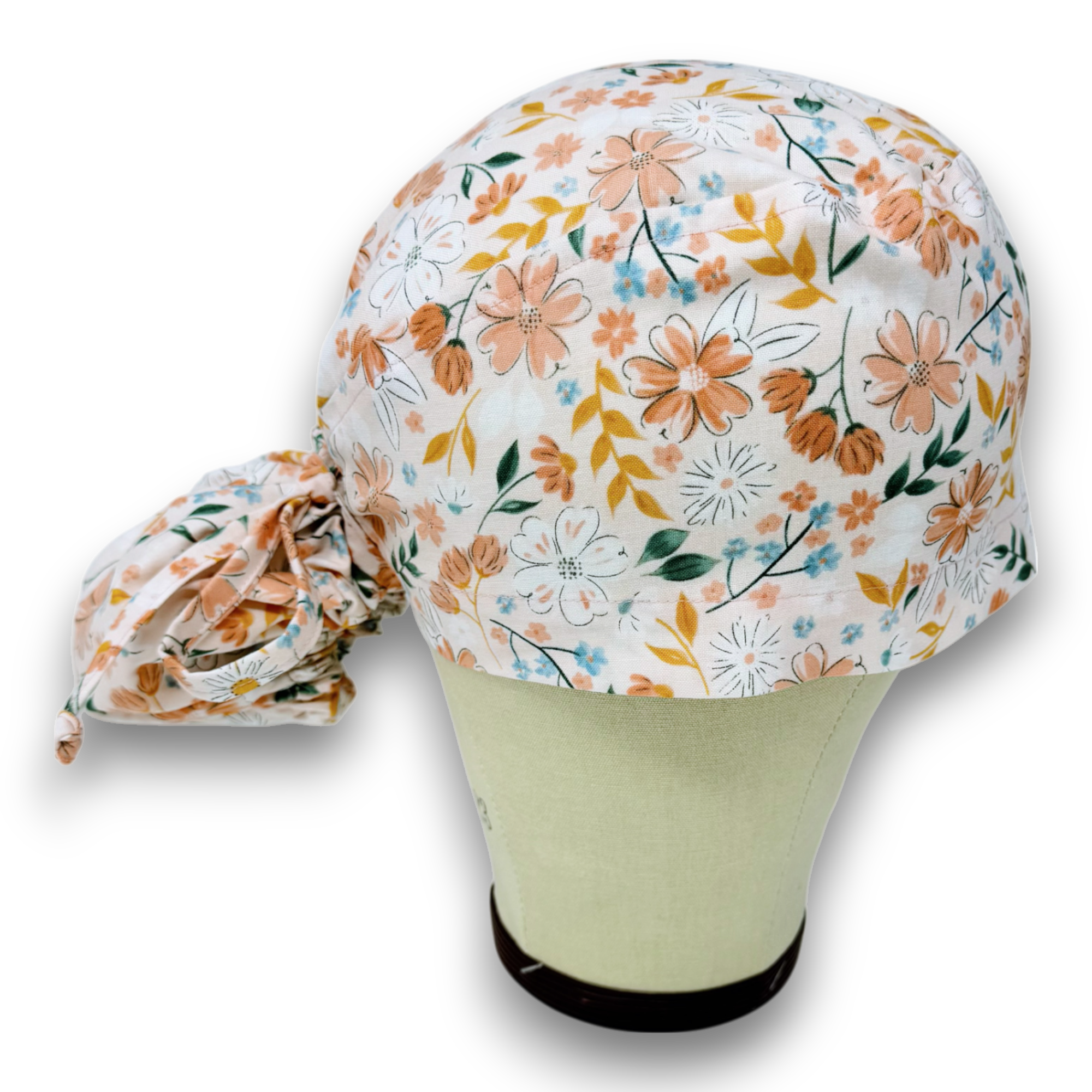 Floral Ponytail scrub cap for women with satin lined option by Paradise Caps.