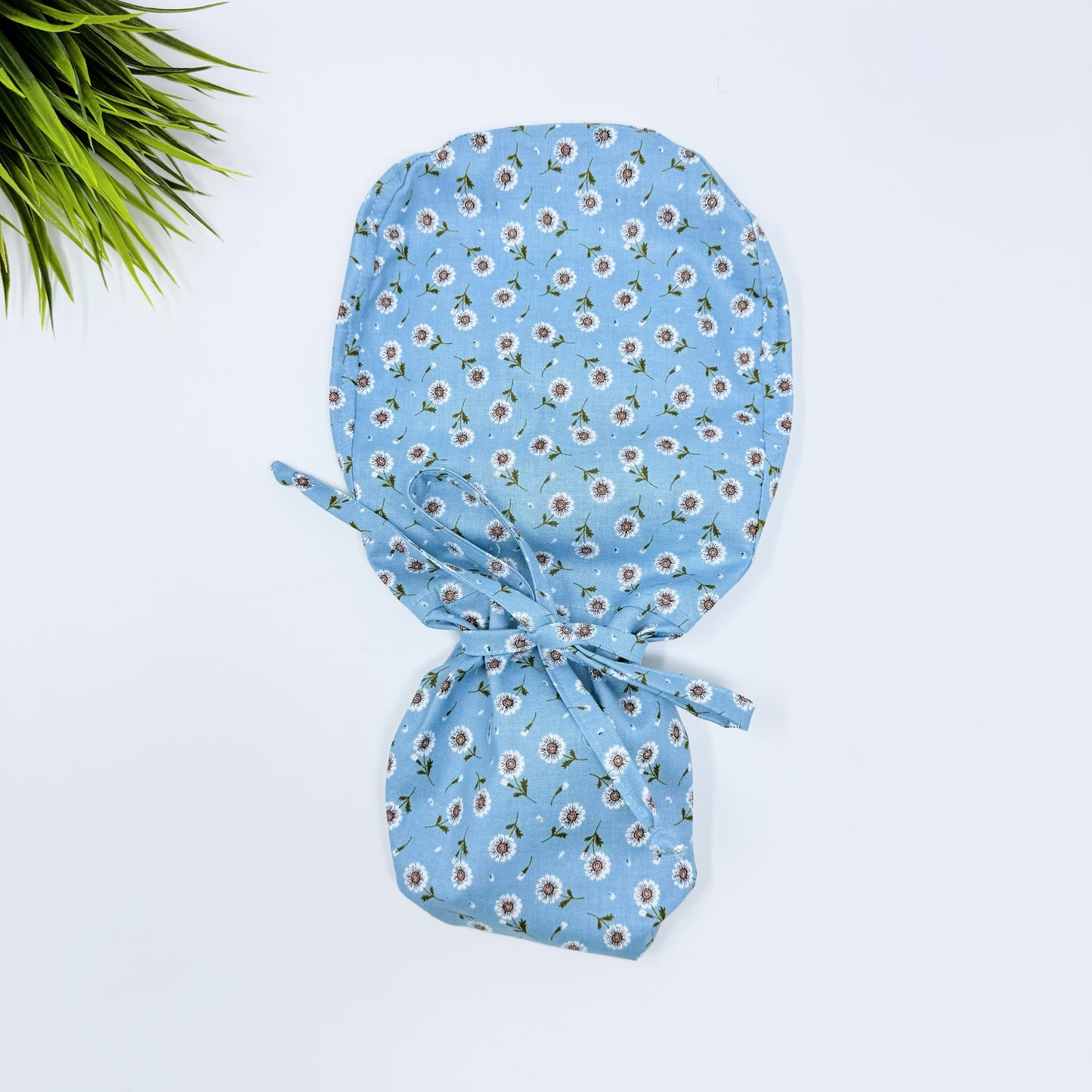 Tossed DaisIes Blue Ponytail scrub cap, Surgical cap women. Satin Lined Option Surgical cap with ponytail.