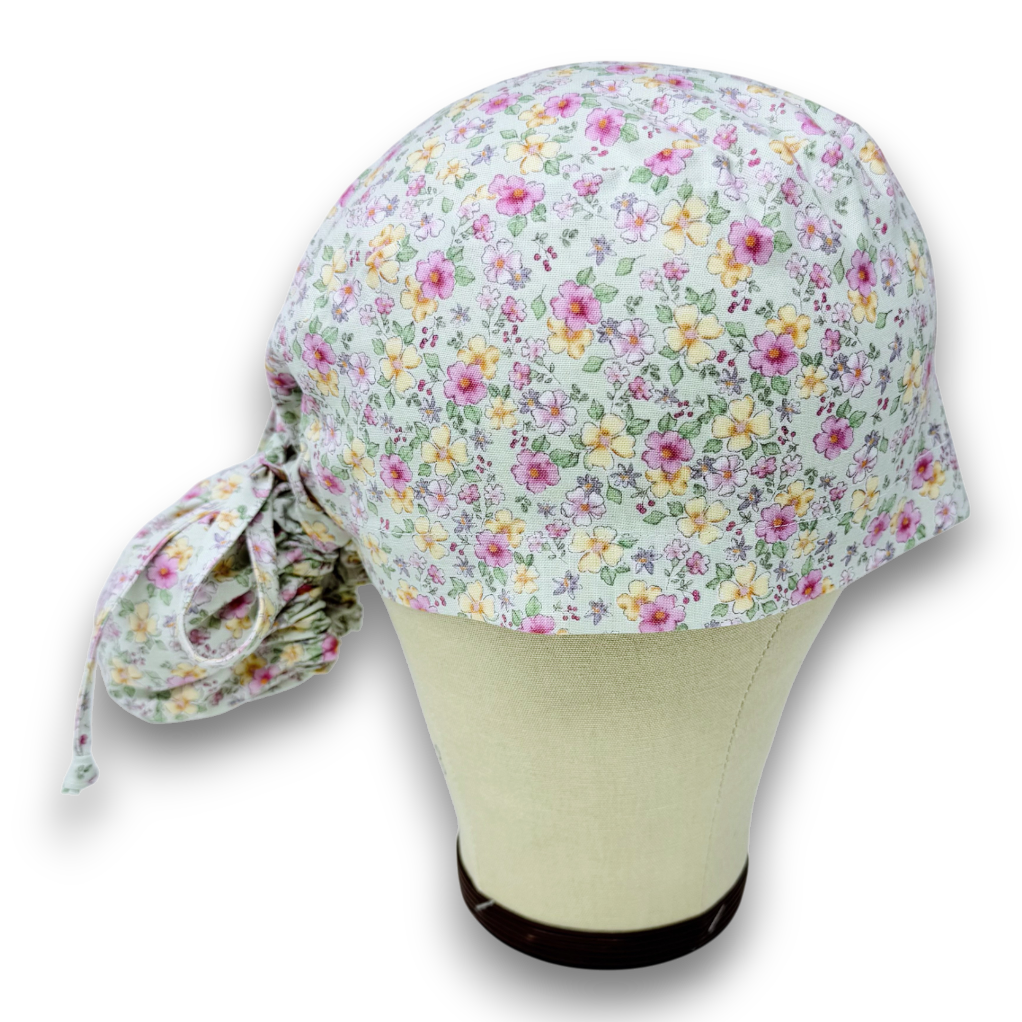 Floral Ponytail scrub cap for women with satin lined option by Paradise Caps.