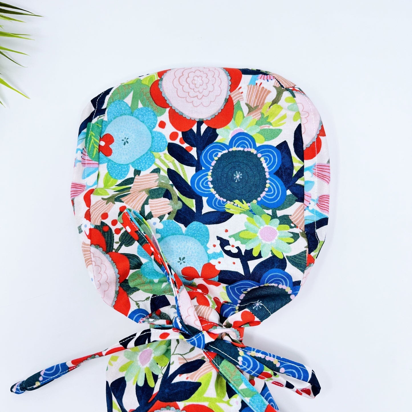 Lovely Planet Floral Ponytail scrub cap, Surgical cap women. Satin Lined Option Surgical cap with ponytail.