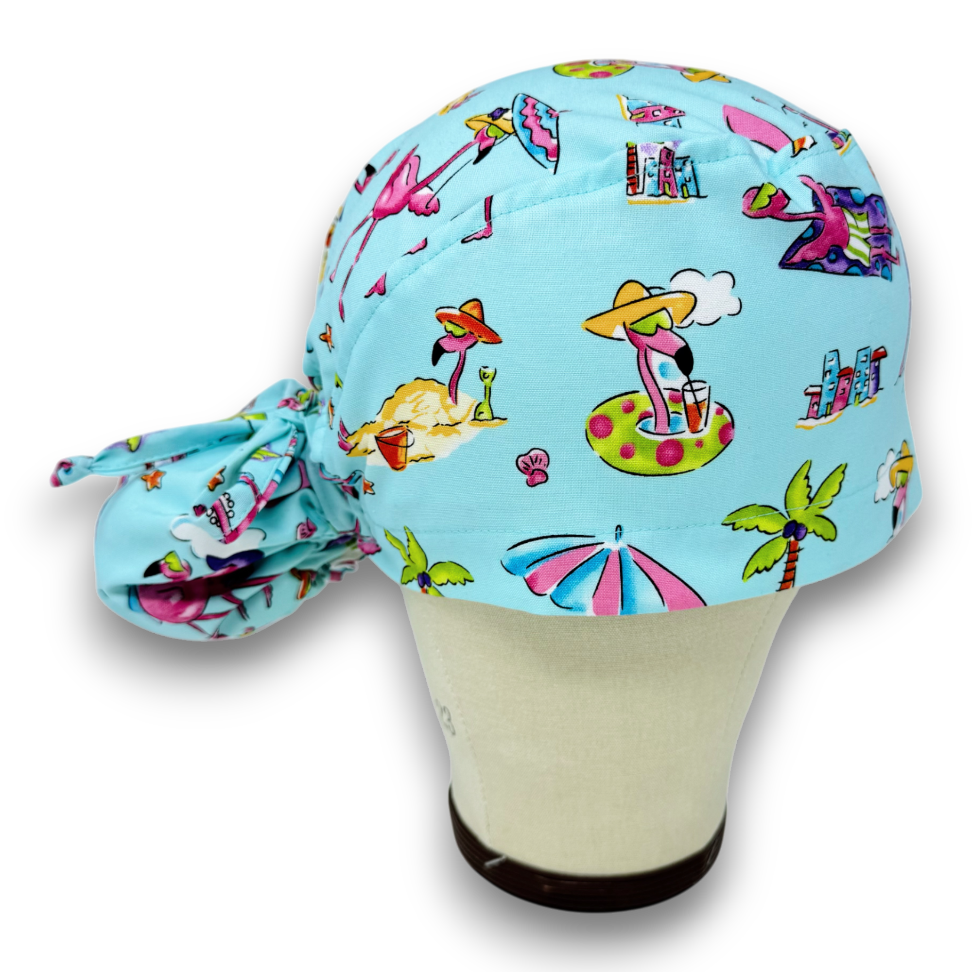 Flamingo Ponytail scrub cap for women with satin lined option by Paradise Caps.