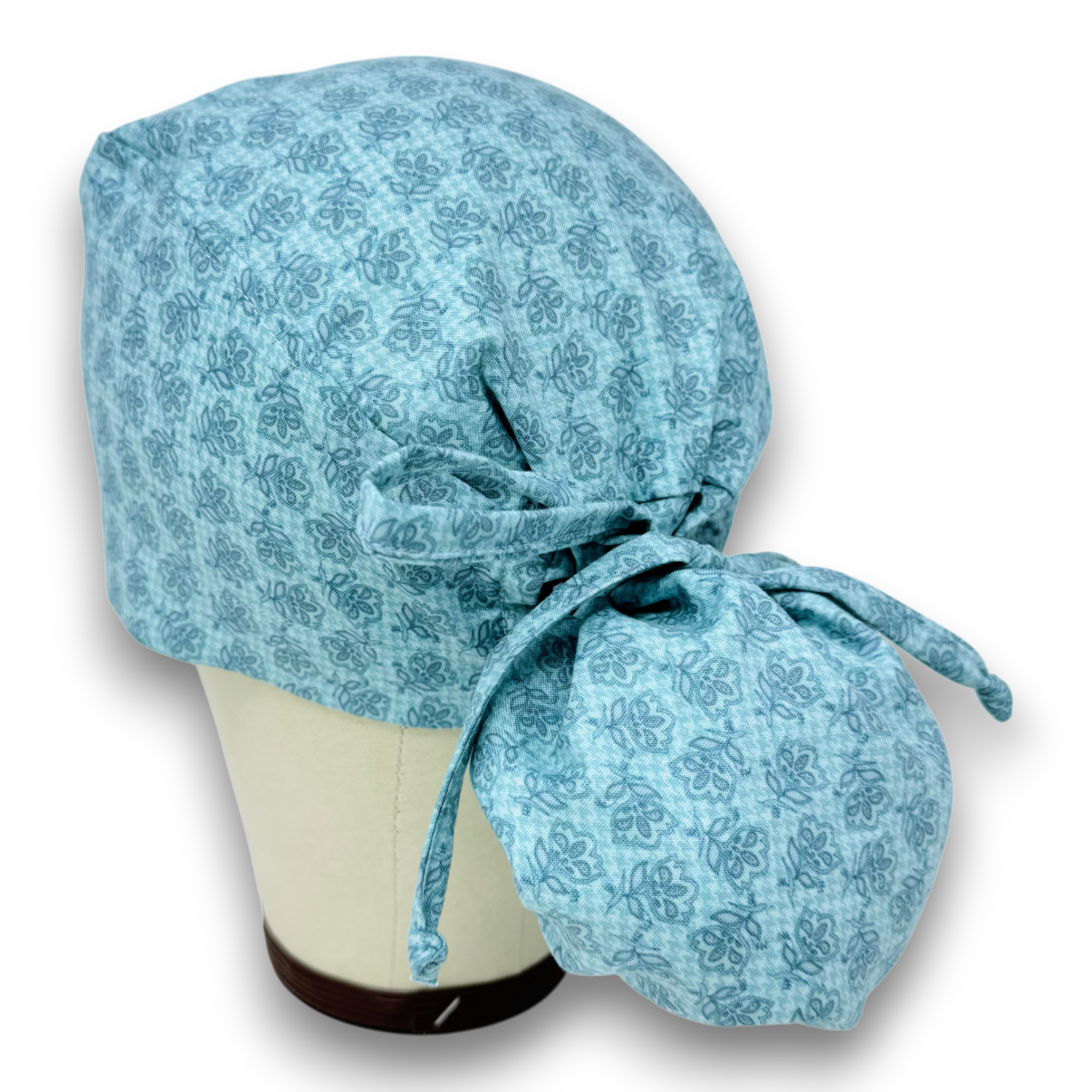 Floral Ponytail scrub cap for women with satin lined option by Paradise Caps.