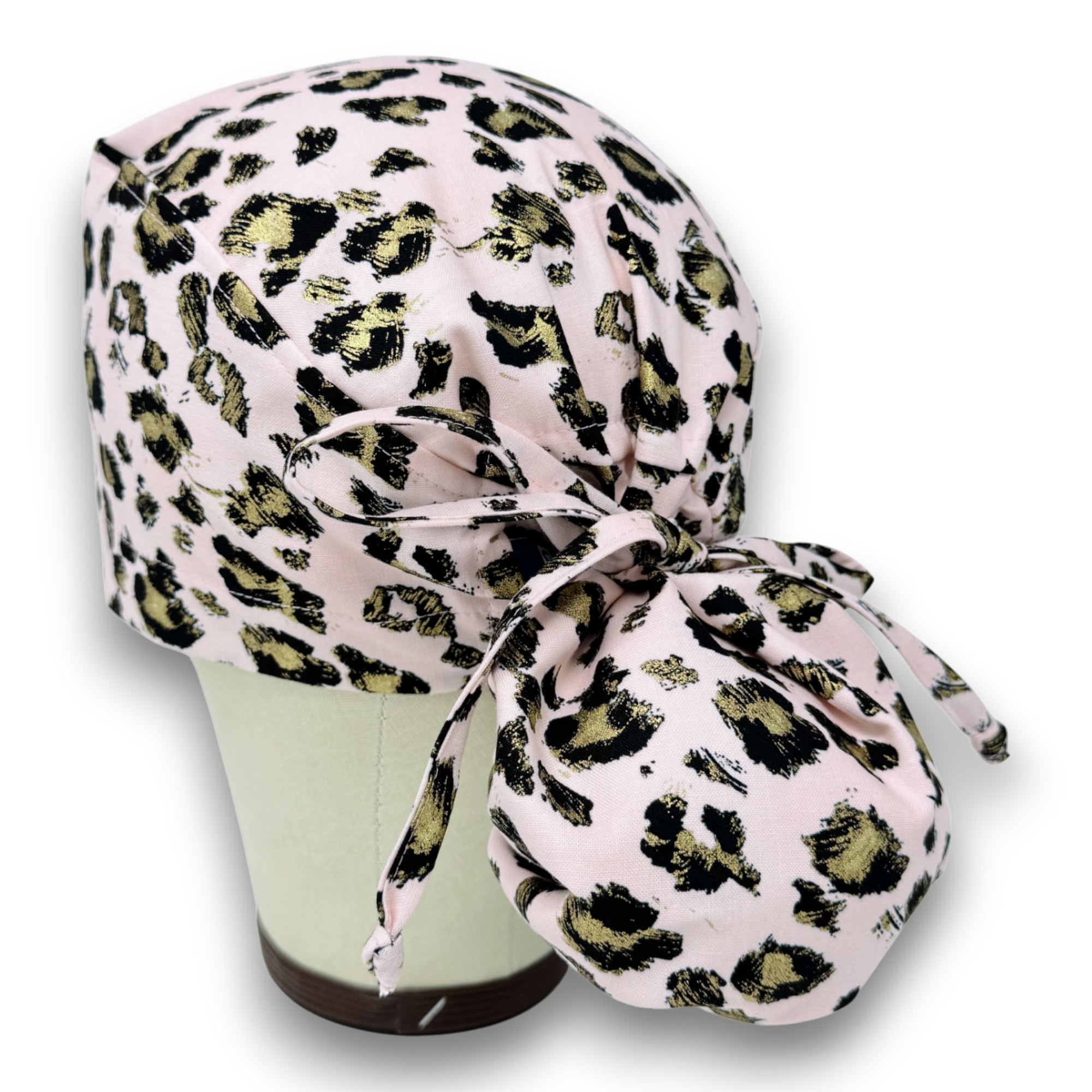 Pink leopard Ponytail scrub cap for women with satin lined option by Paradise Caps.