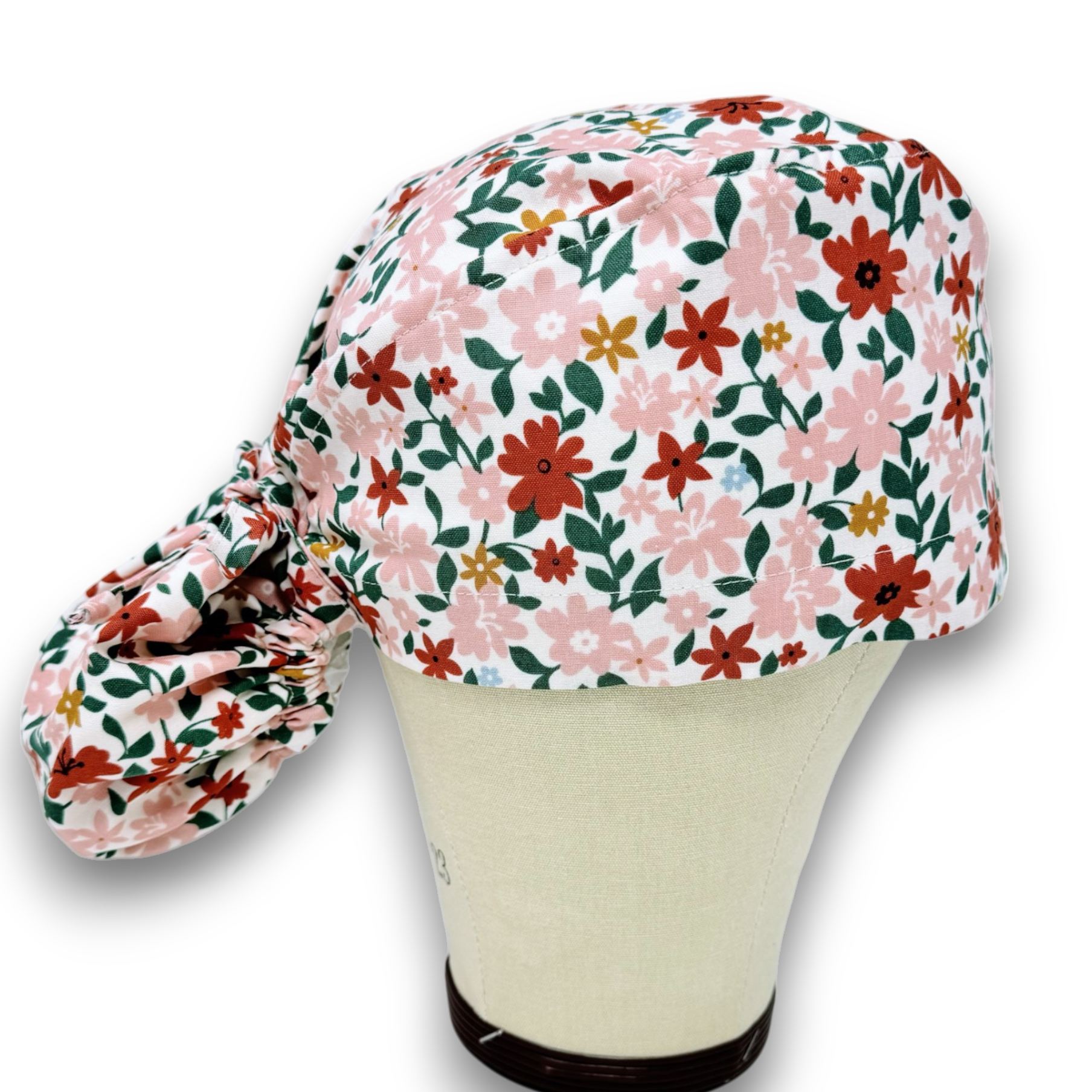 Floral Ponytail scrub cap for women with satin lined option by ParadiseCaps.