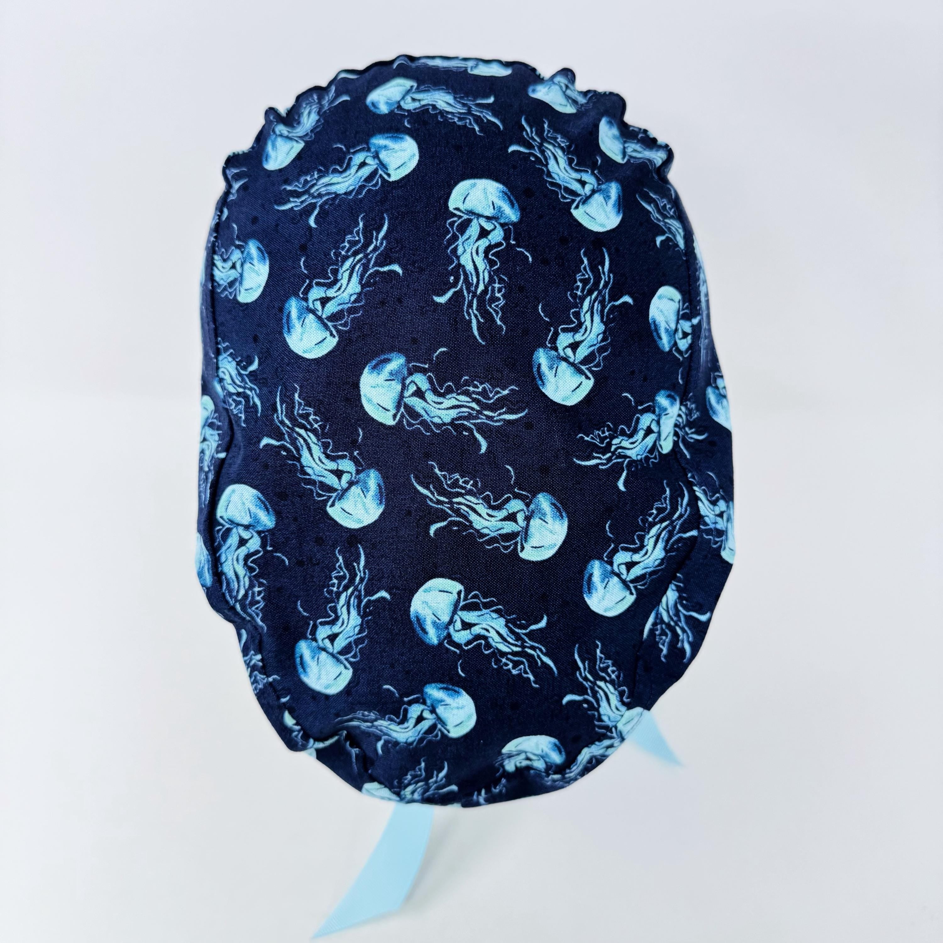 Jellyfish Euro scrub cap with ties for women. Navy Blue Ocean Print European satin lined surgical cap by Paradise Caps. Euro PLUS style.