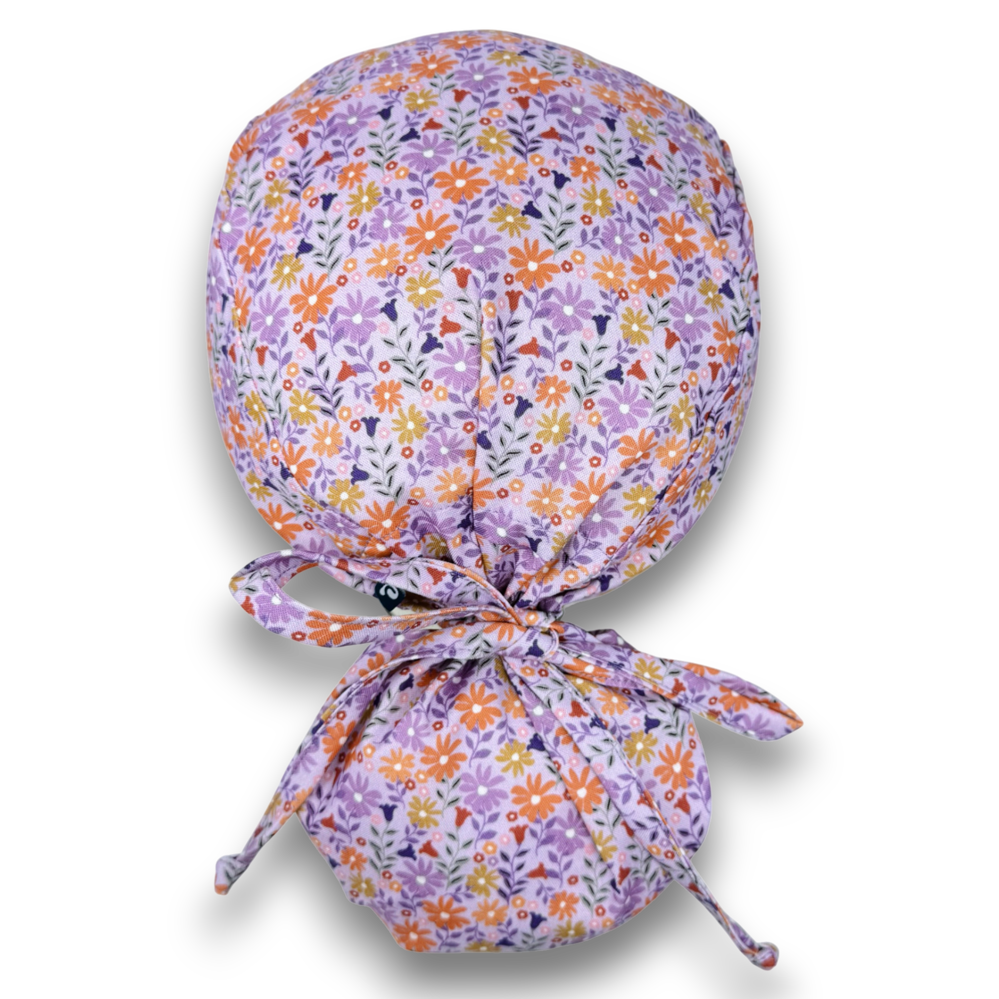 Purple Daisy Ponytail scrub cap for women. Flower Scrub hat for women with satin lined option by Paradise Caps.