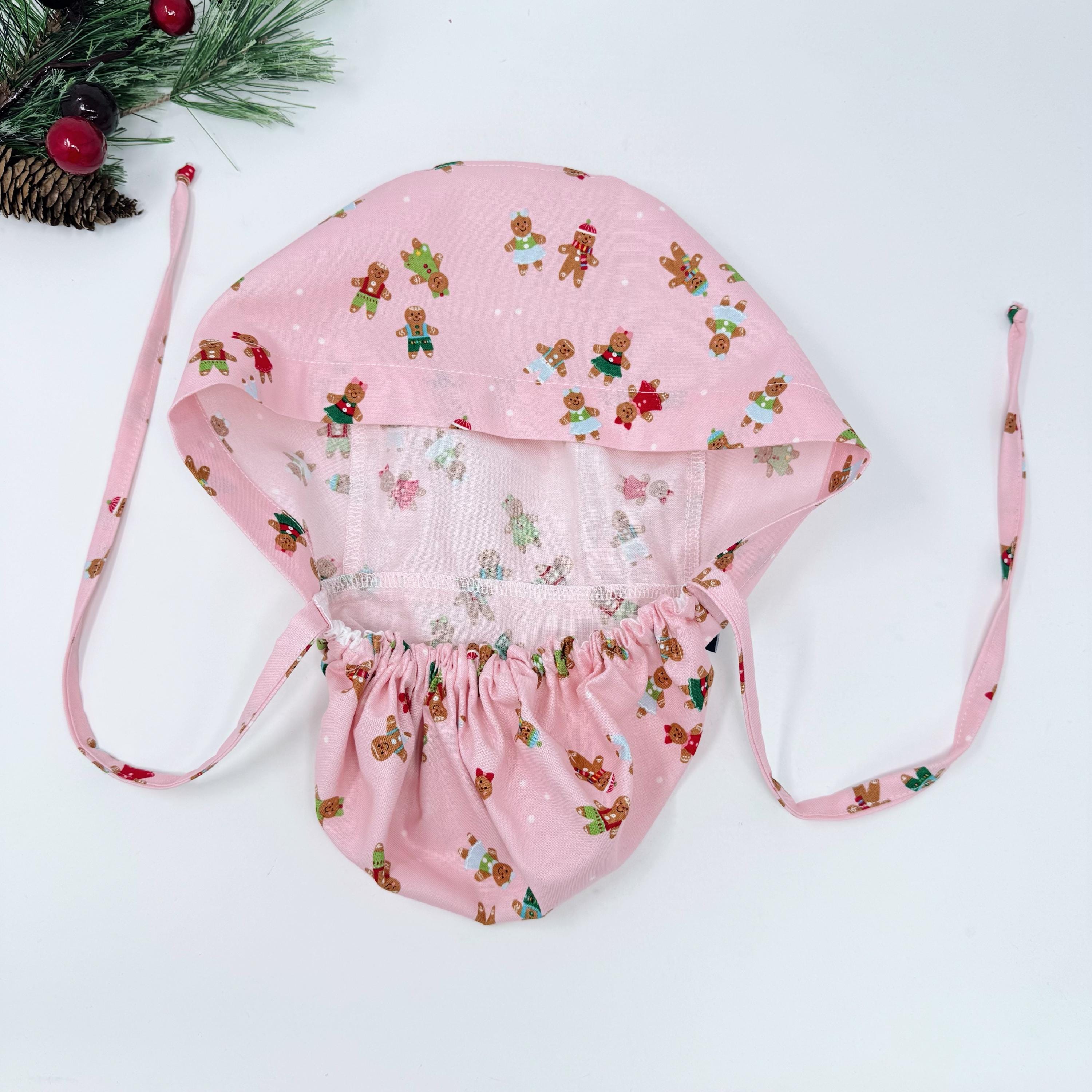 Gingerbread Ponytail scrub cap with Satin Lined. Cute Christmas surgical scrub hats for women by Paradise Caps. Pink