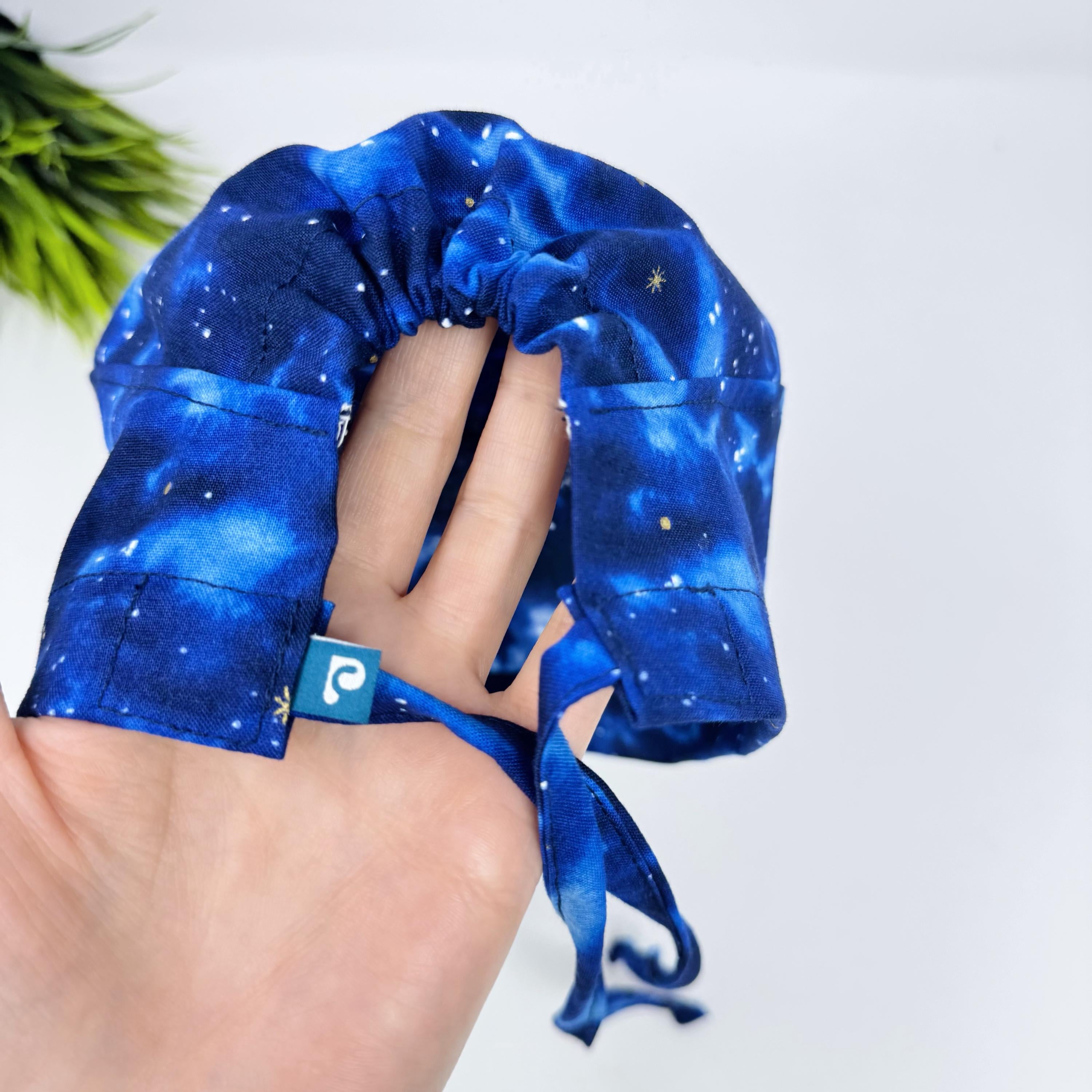 Night sky Men's Skull tie-back style surgical scrub cap for men by Paradise Caps.