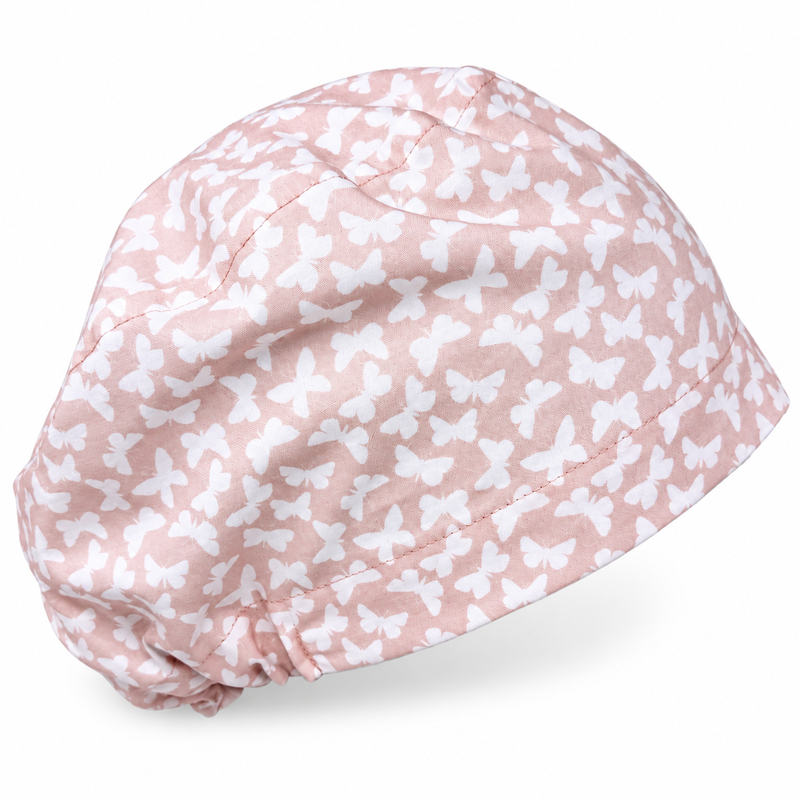 Blush Butterflies Euro scrub cap for women with satin lined option by Paradise Caps. on white background with soft shadow