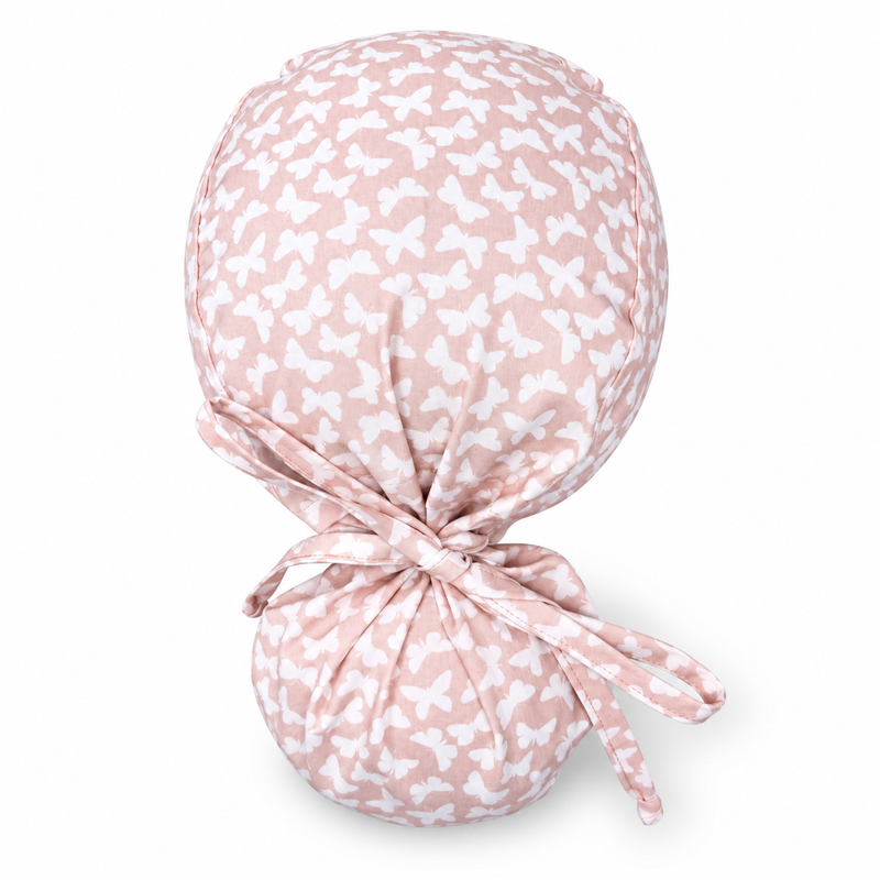 Blush Butterflies Ponytail scrub cap for women with satin lined option by Paradise Caps. on white background with soft shadow