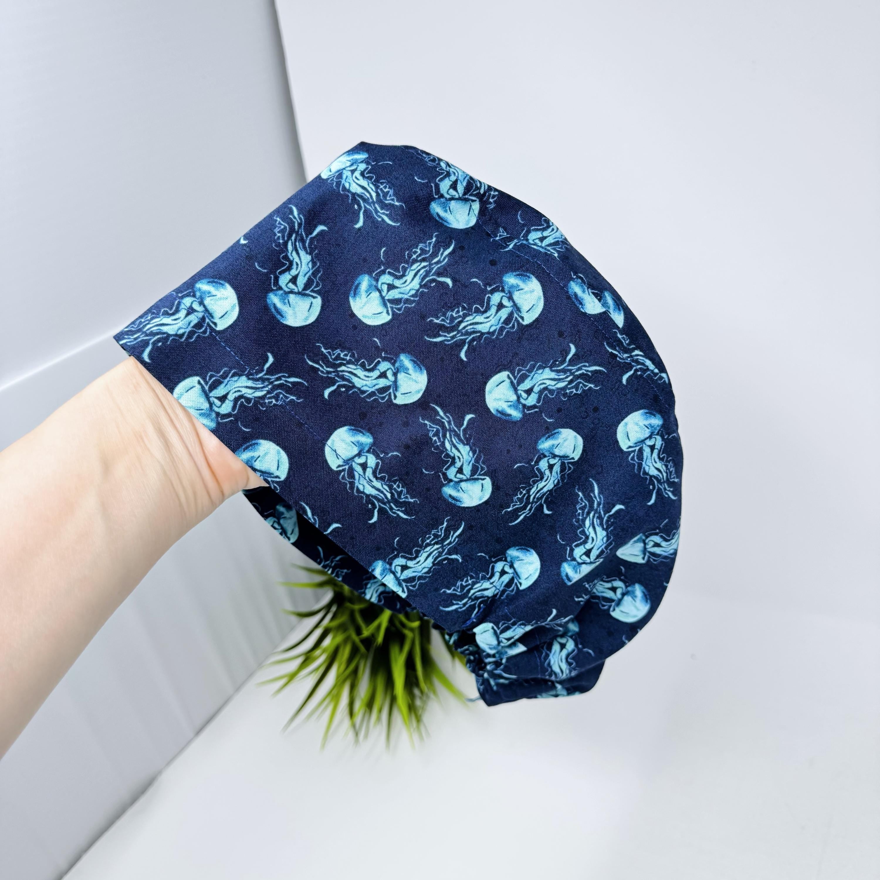 Jellyfish Euro scrub cap for women. Navy Blue Ocean Print surgical hap with satin lined option by Paradise Caps.