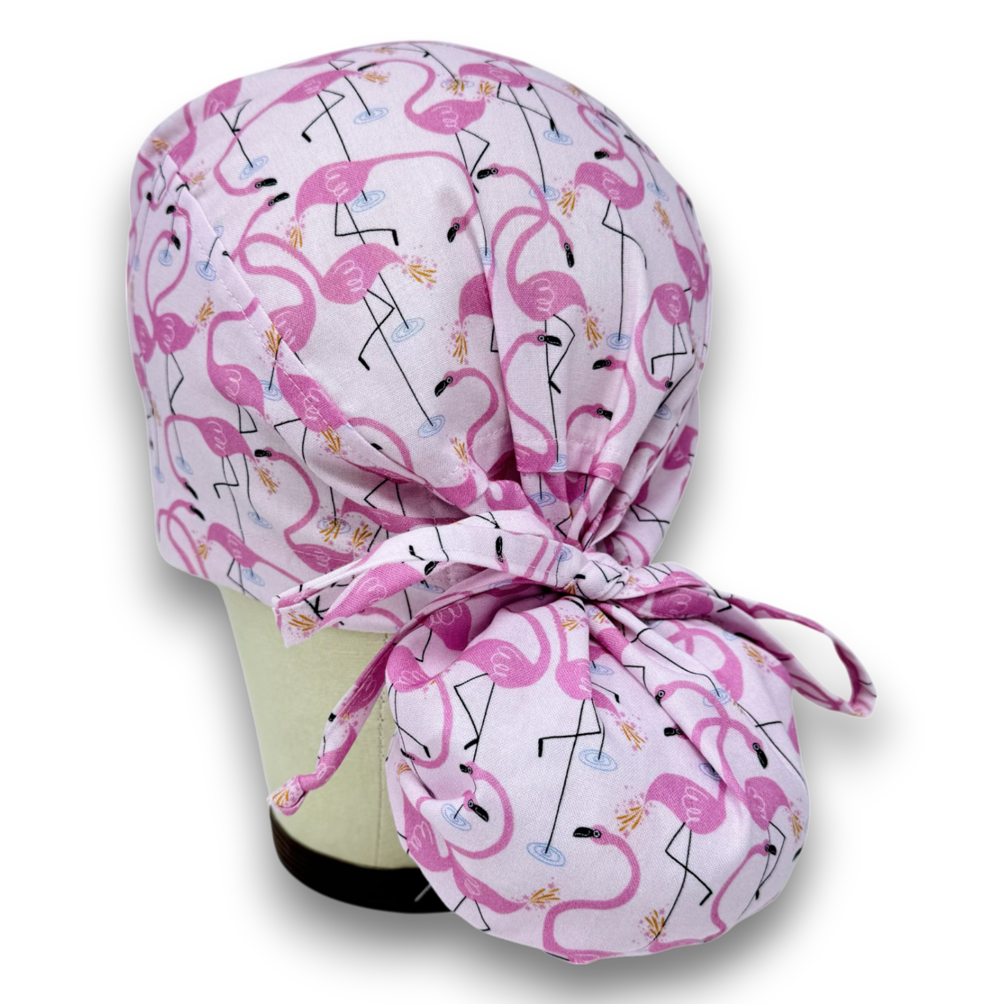 Flamingo Ponytail scrub cap for women with satin lined option by Paradise Caps.