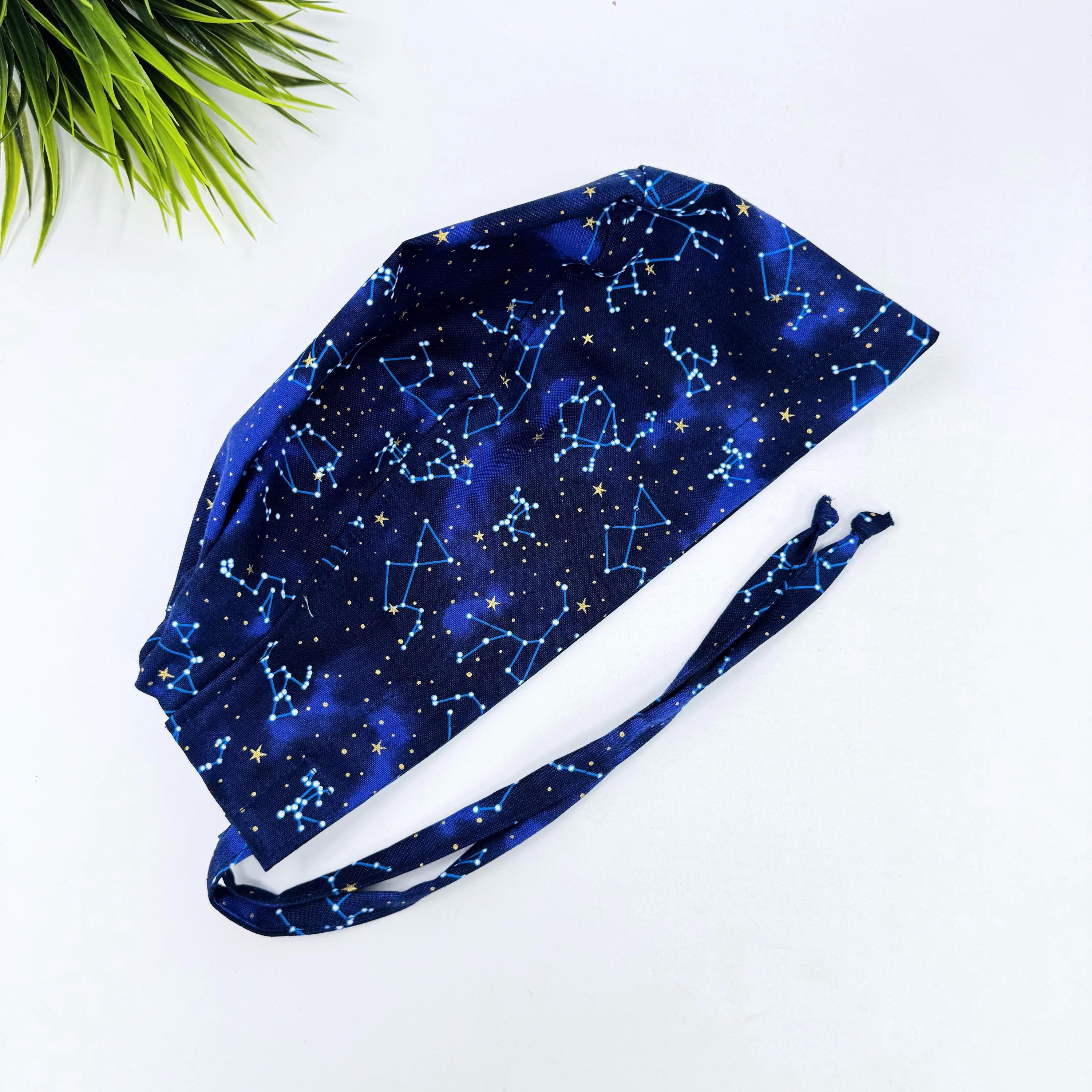 Constellation Men's Skull tie-back style surgical scrub cap for men by Paradise Caps.