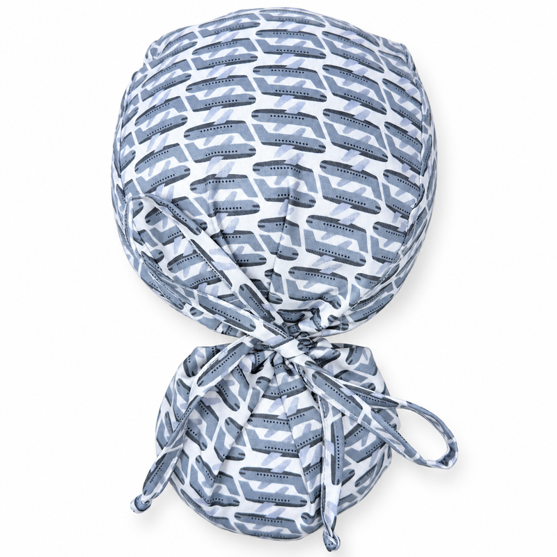 Gray Airplanes ponytail scrub cap with soft shadow on white, mannequin-free close-up