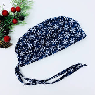 Snowflakes Skull tie-back style surgical scrub cap for men by Paradise Caps.