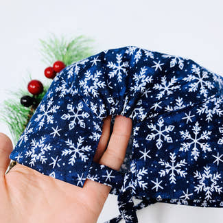 Snowflakes Skull tie-back style surgical scrub cap for men by Paradise Caps.