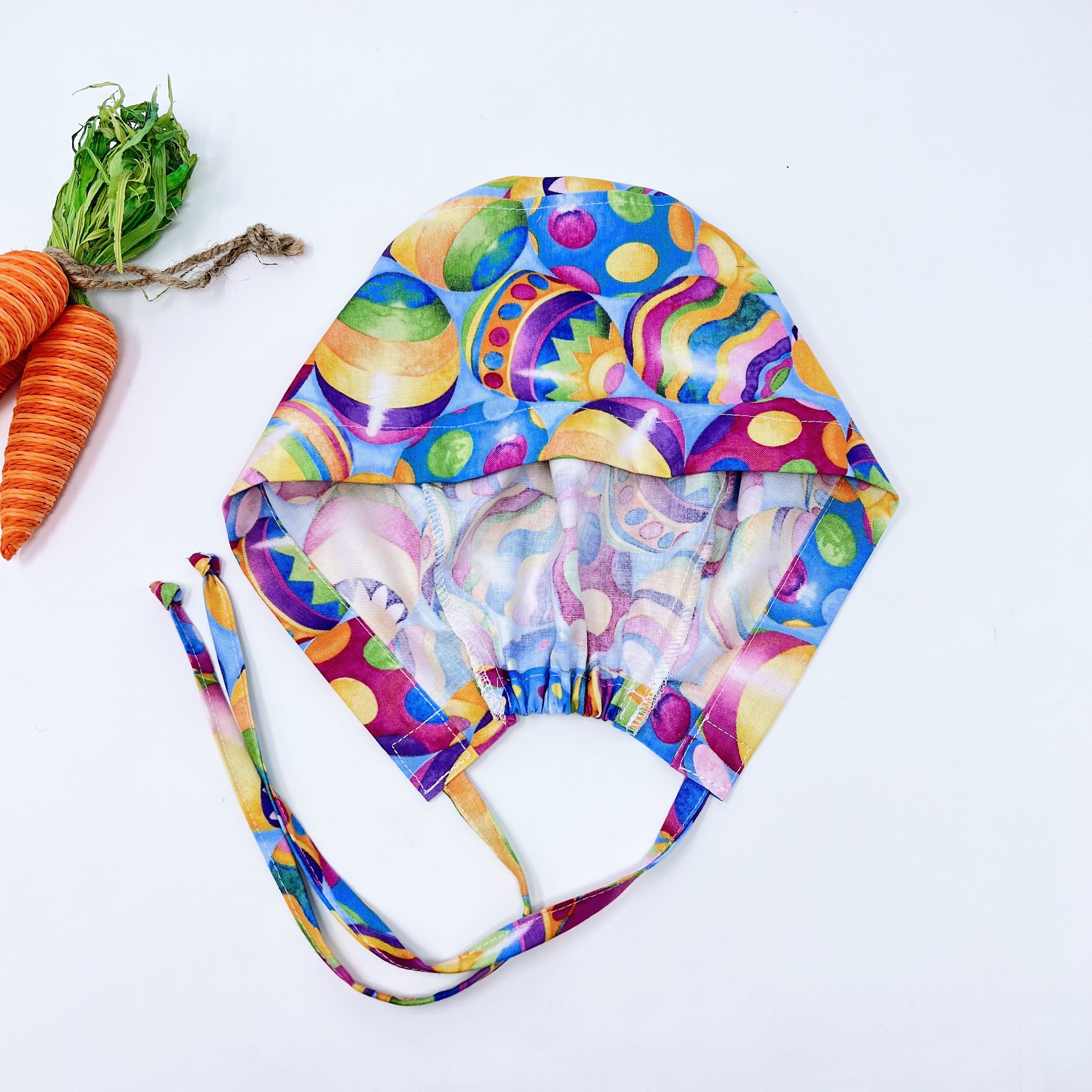 Easter Skull tie-back style surgical scrub cap. Egg surgical cap for women with satin lined option by Paradise Caps.