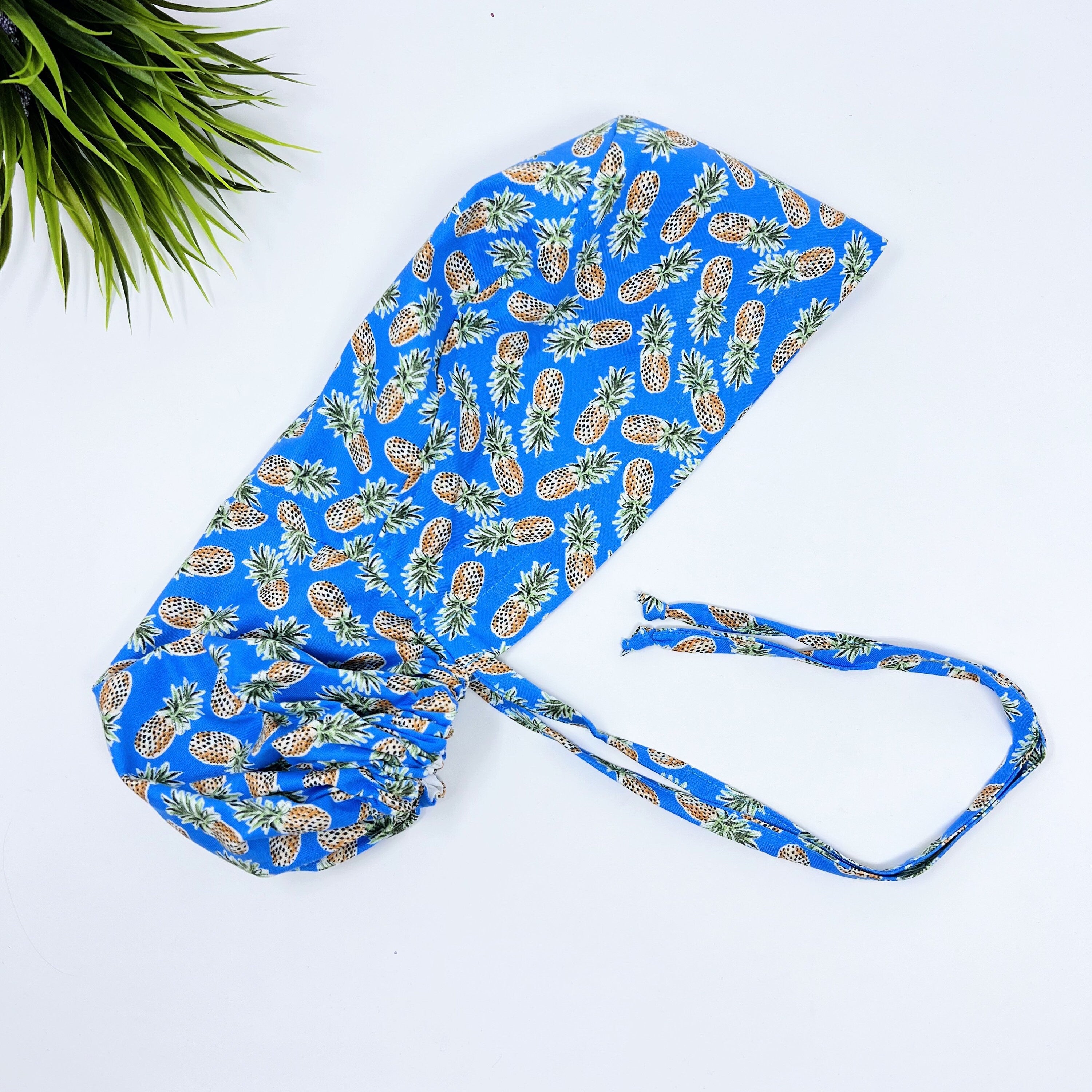 Pineapple Ponytail scrub cap for women with satin lined option by Paradise Caps.