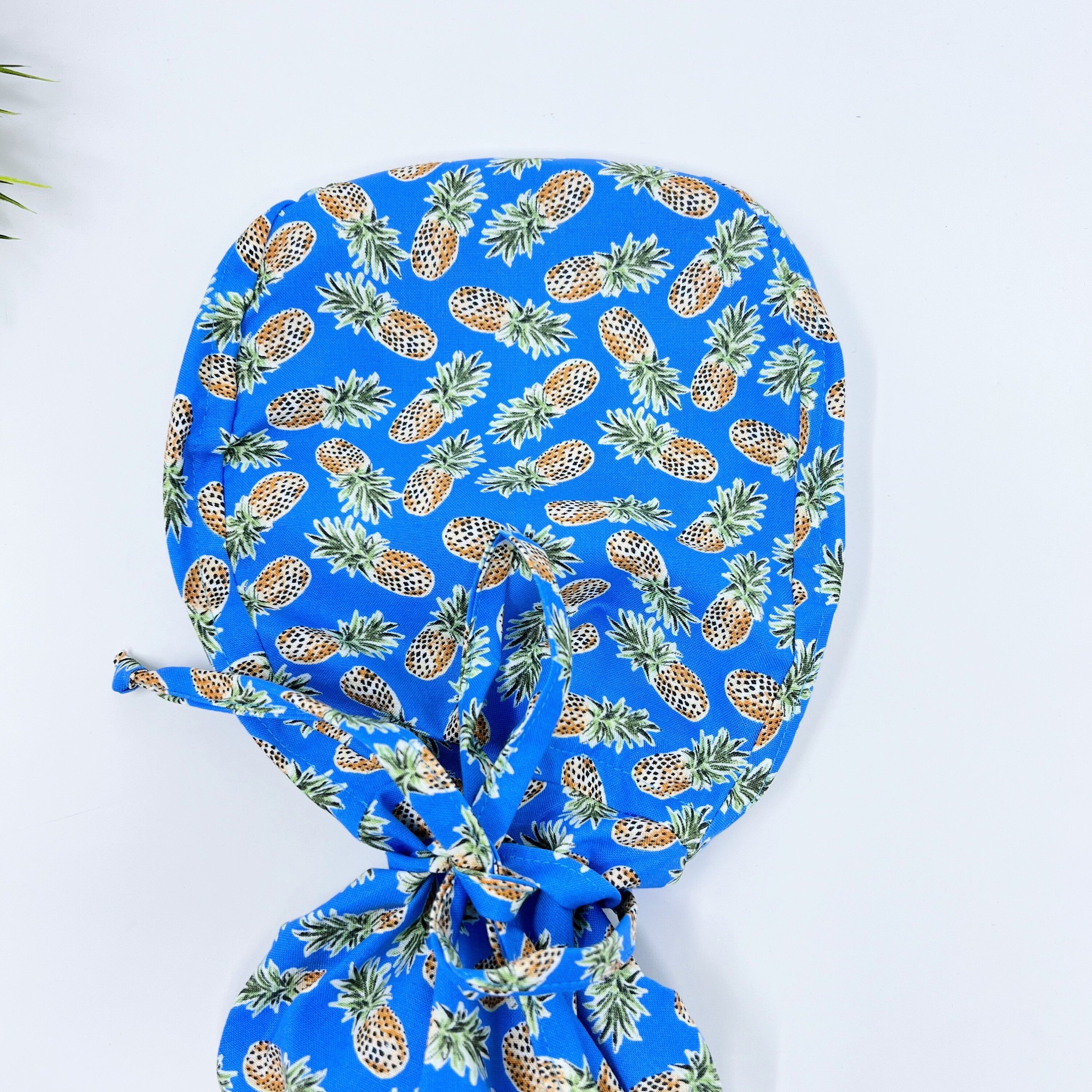 Pineapple Ponytail scrub cap for women with satin lined option by Paradise Caps.