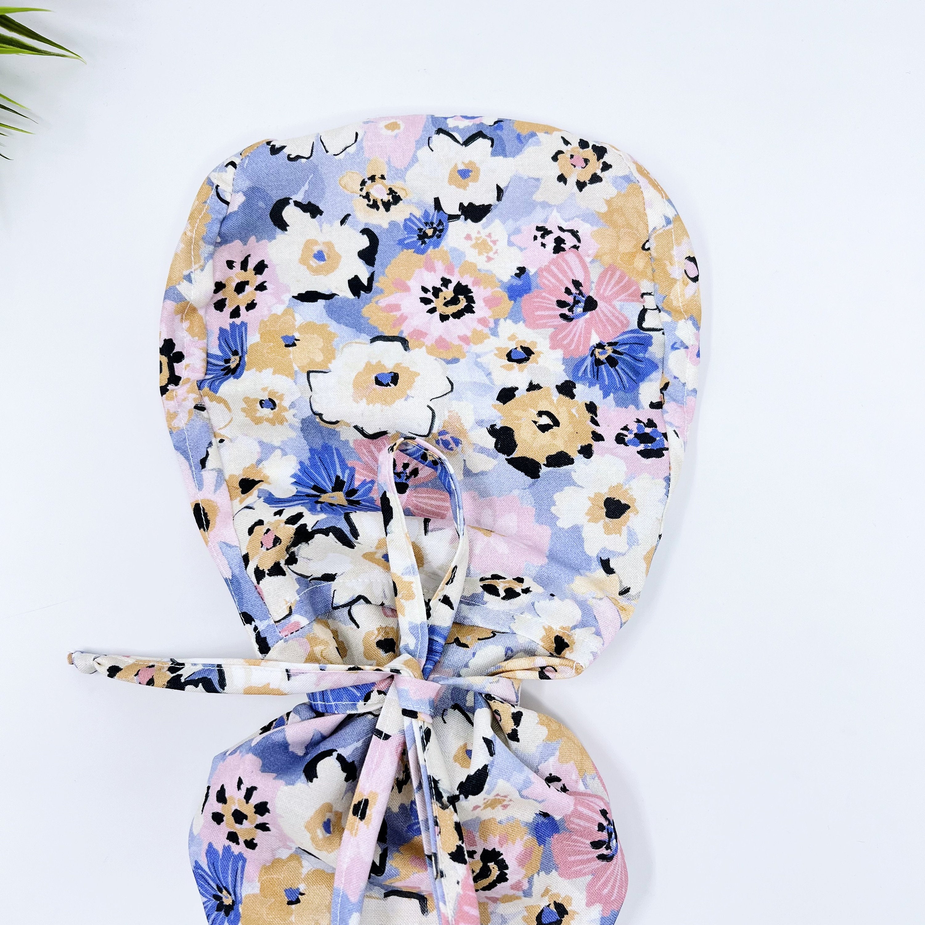 Multi Fleurs Ponytail scrub cap for women with satin lined option by Paradise Caps.