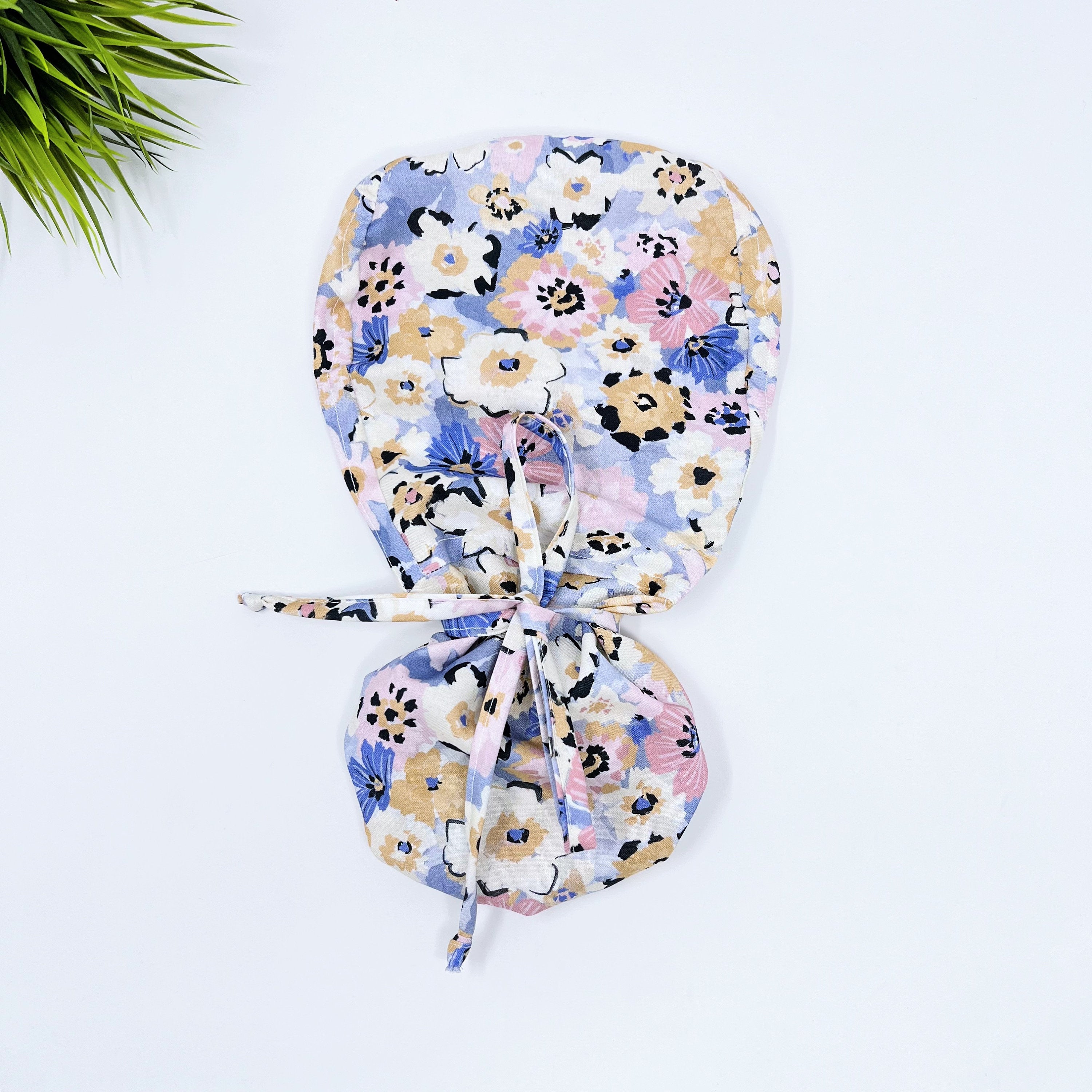 Multi Fleurs Ponytail scrub cap for women with satin lined option by Paradise Caps.