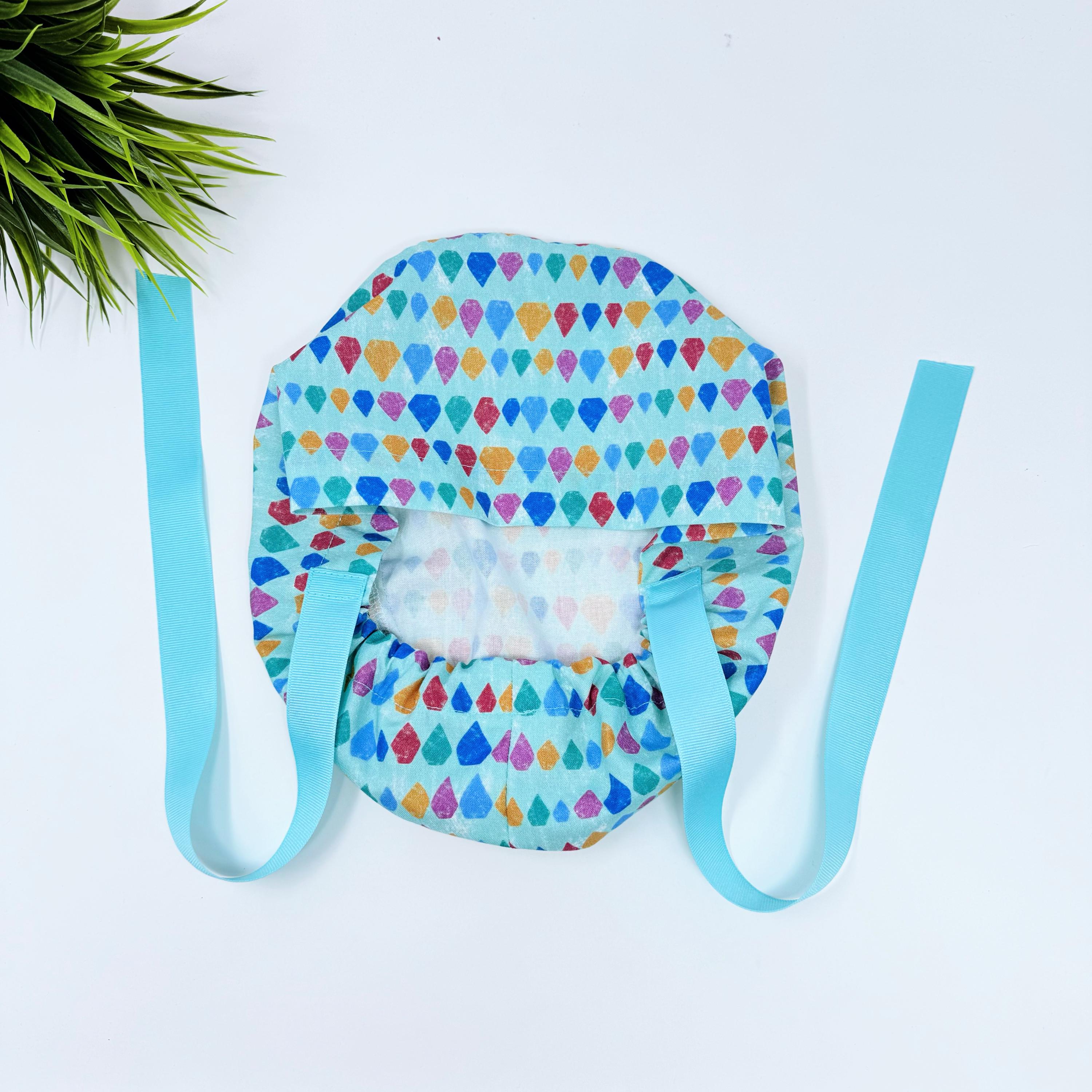 Aqua Scales Euro scrub cap with ties for Women by Paradise Caps. Euro PLUS style.