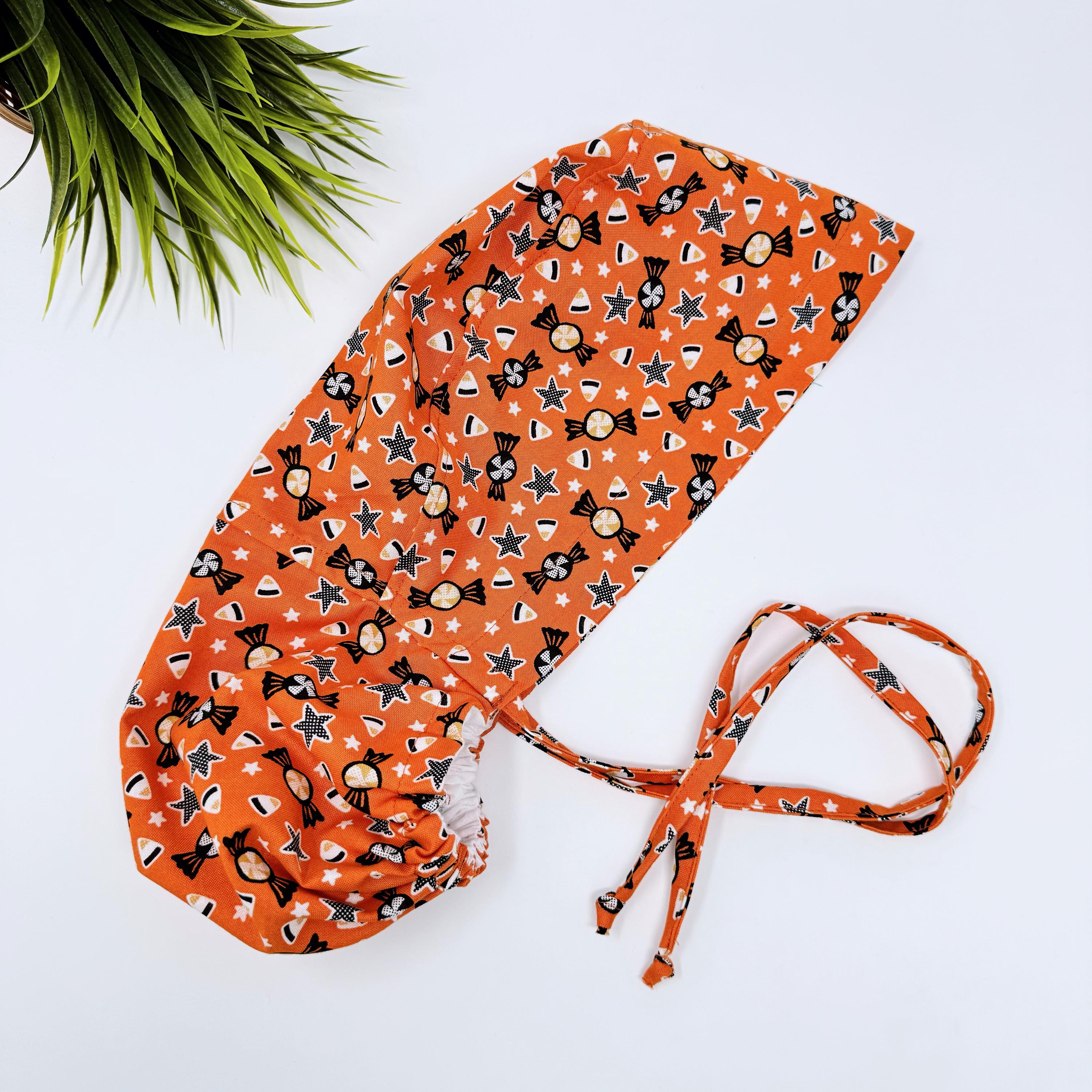 Candy corn Ponytail scrub cap for women with satin lined option by Paradise Caps.