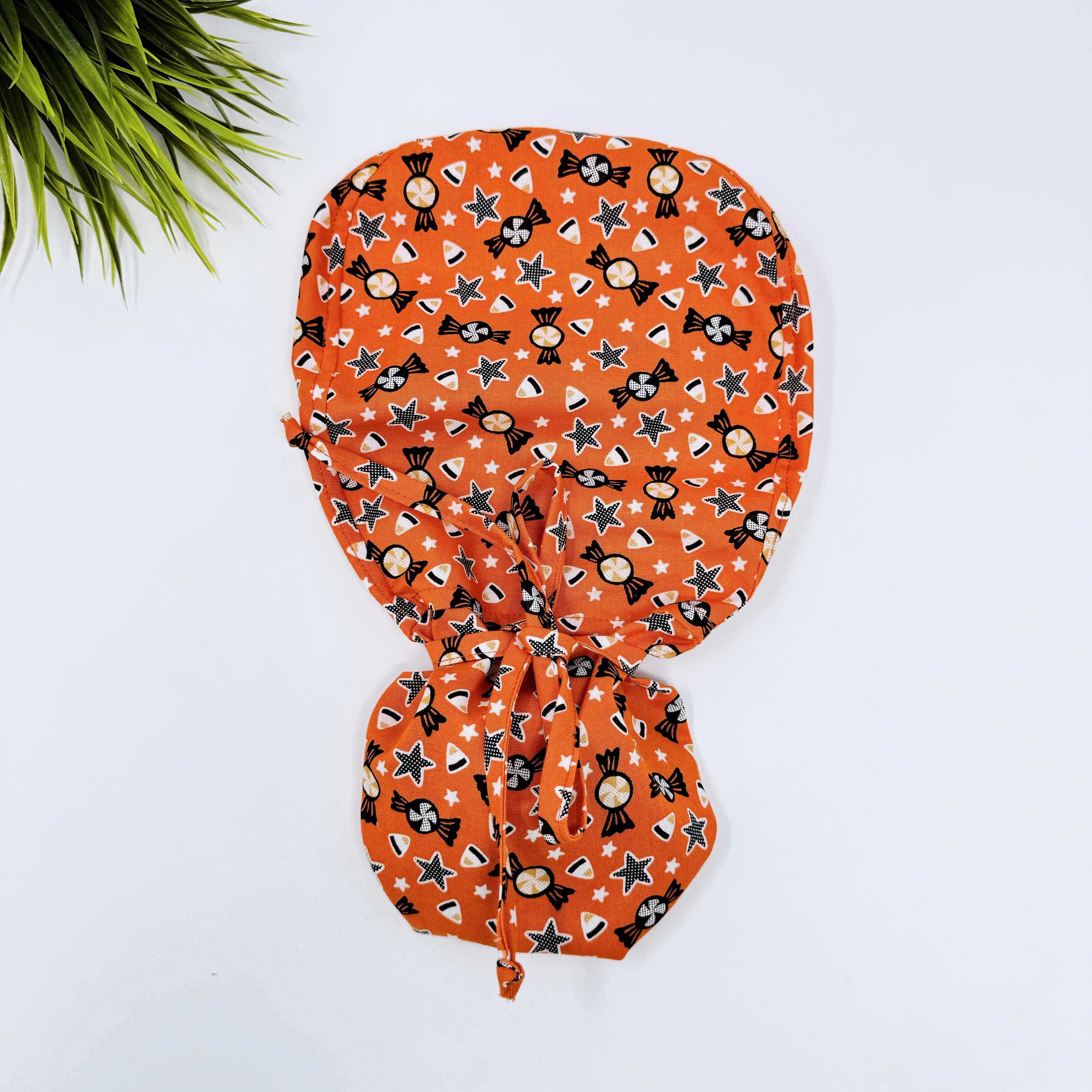 Candy corn Ponytail scrub cap for women with satin lined option by Paradise Caps.