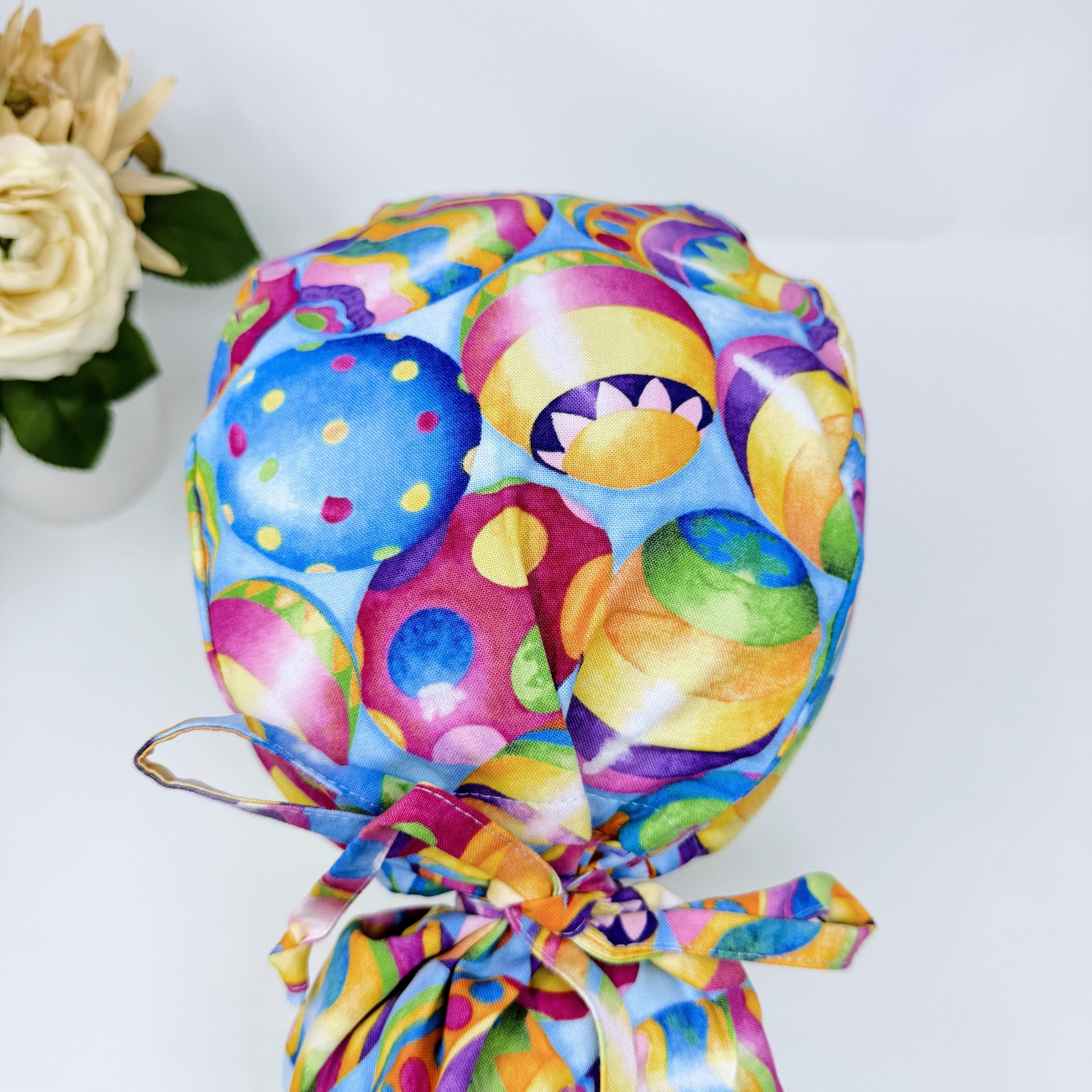 Easter Egg Ponytail scrub cap for women with satin lined option by Paradise Caps.