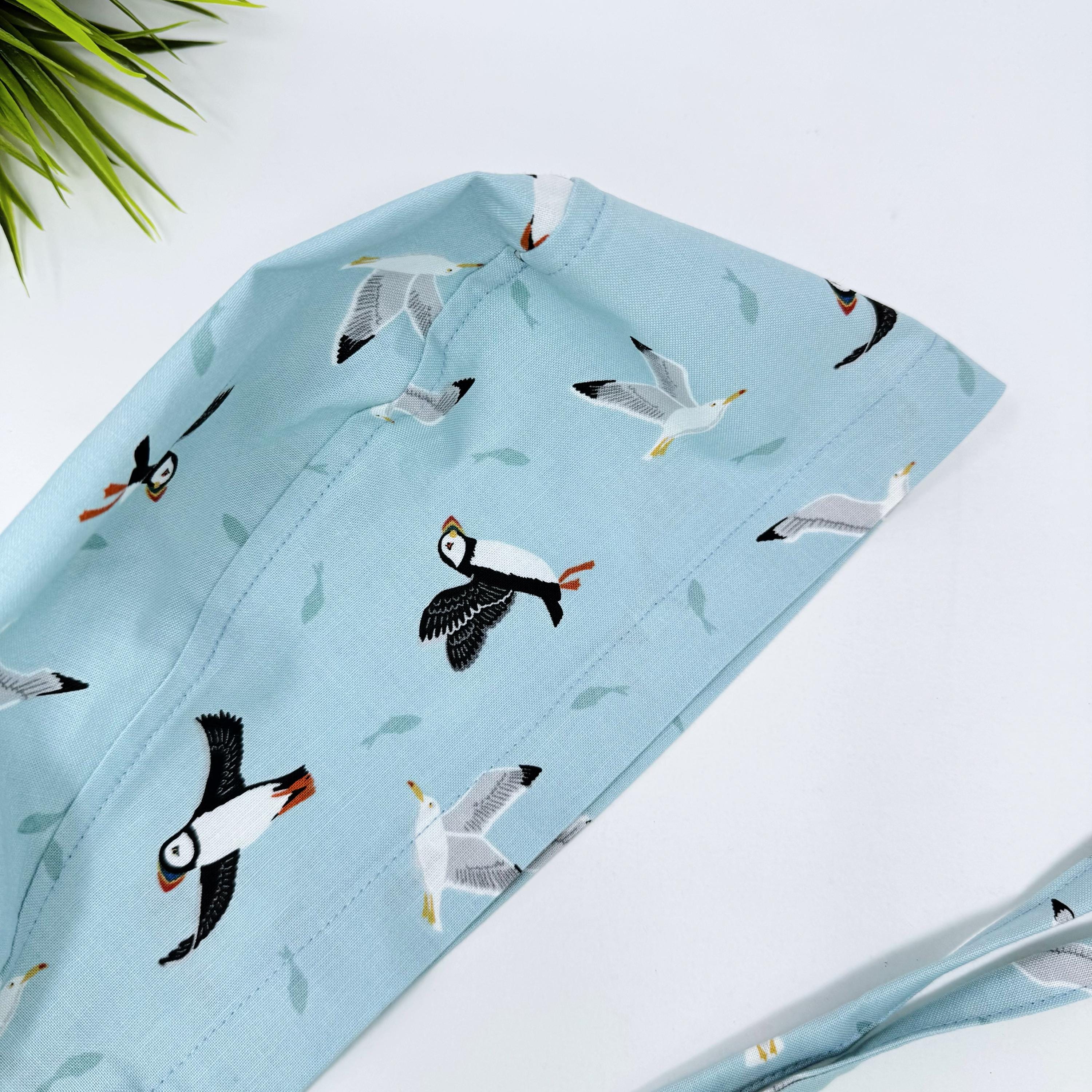 Puffin Skull tie-back style surgical scrub cap for men by Paradise Caps.