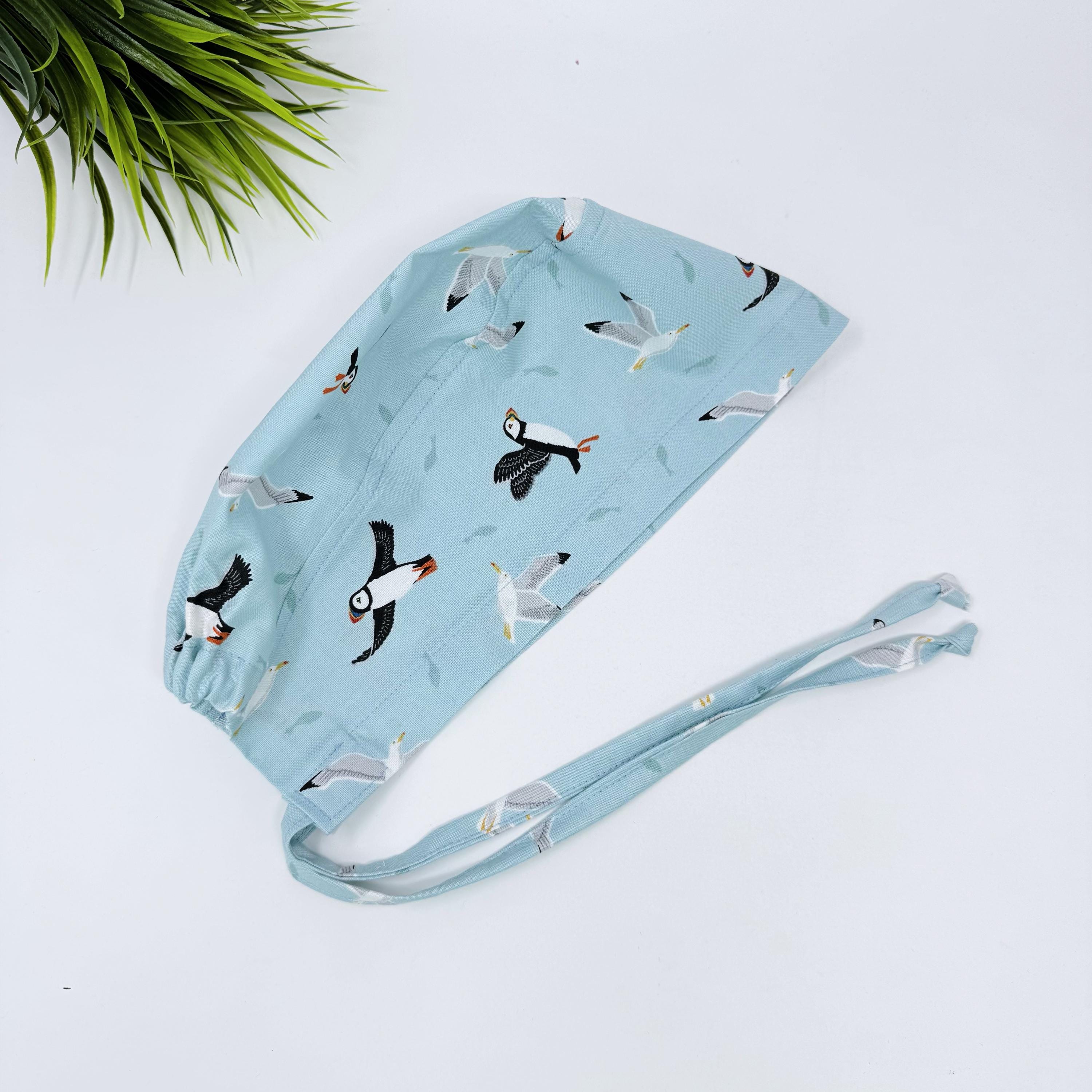 Puffin Skull tie-back style surgical scrub cap for men by Paradise Caps.