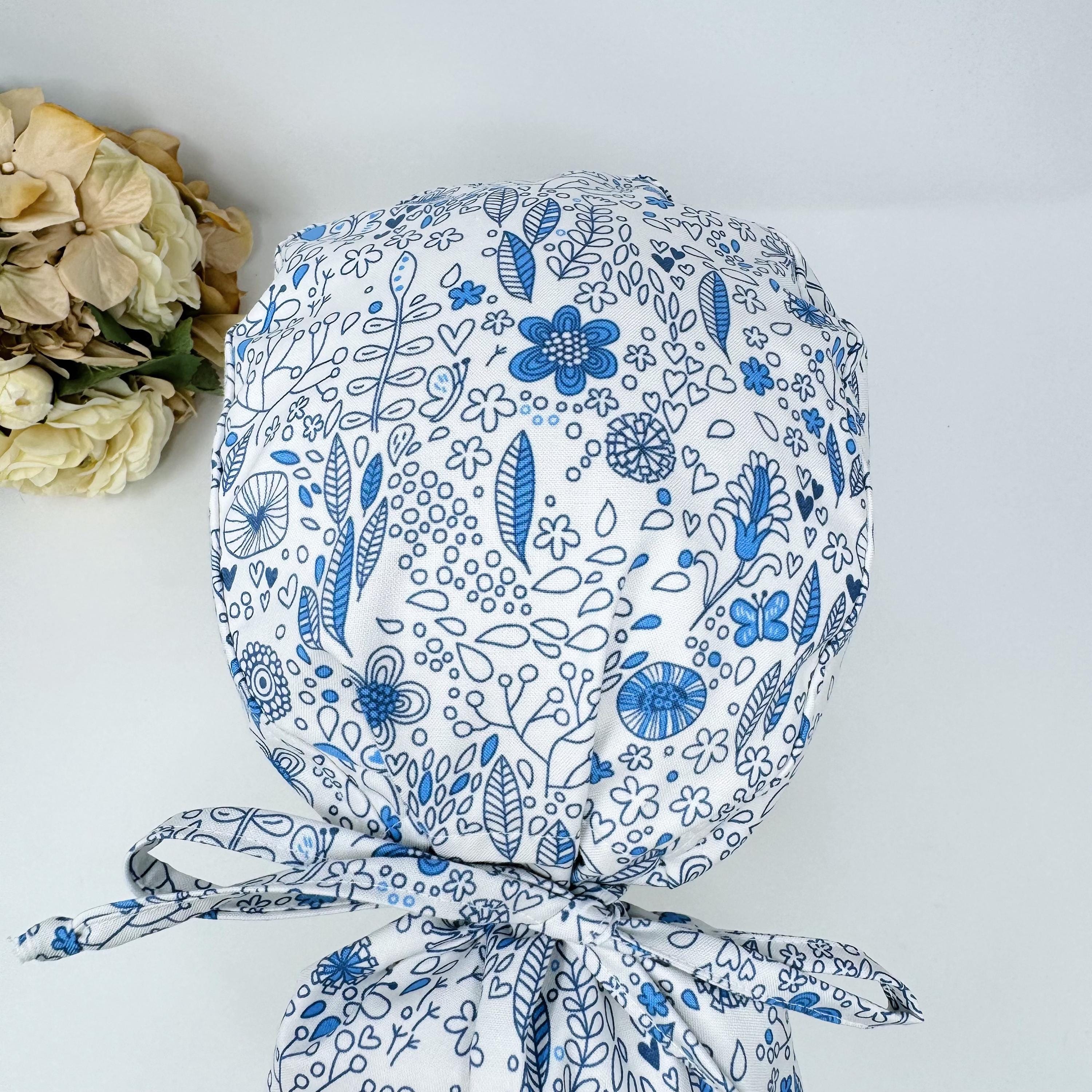 Floral Ponytail scrub cap for women. Summer Scrub hat for women with satin lined option by Paradise Caps.