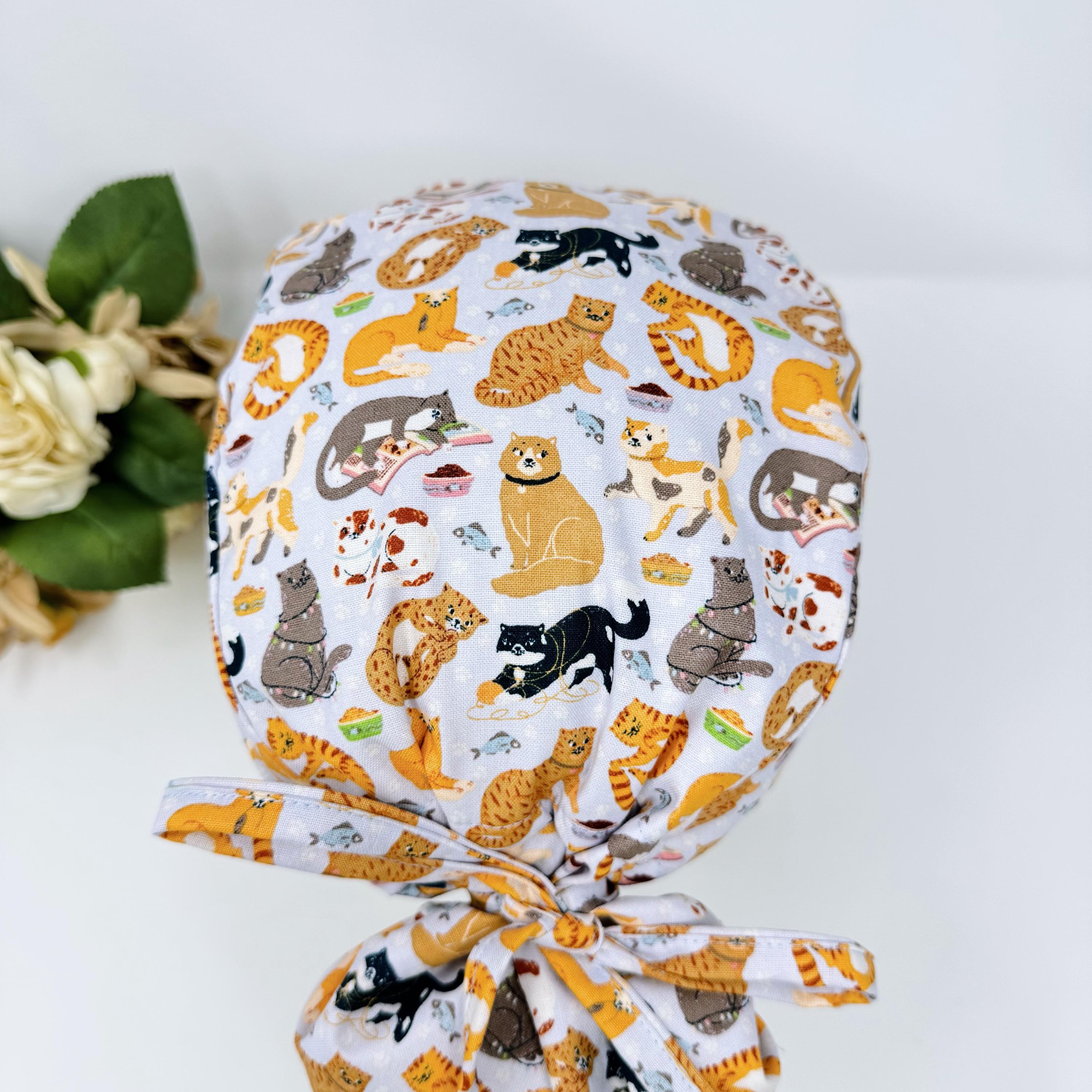 Cat Ponytail scrub cap for women with satin lined option by Paradise Caps.