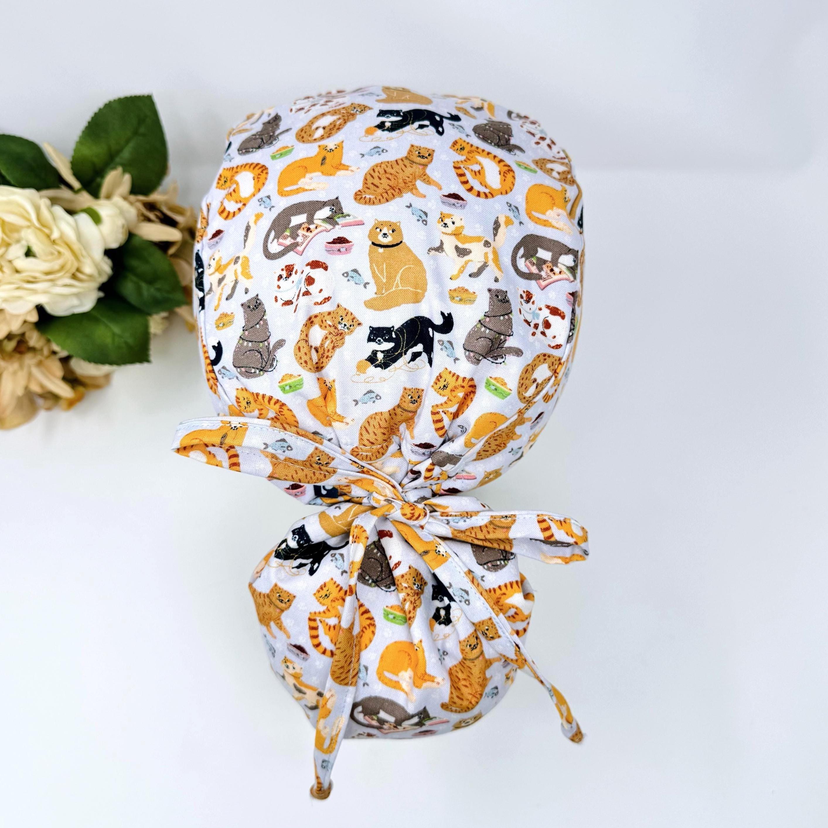 Cat Ponytail scrub cap for women with satin lined option by Paradise Caps.