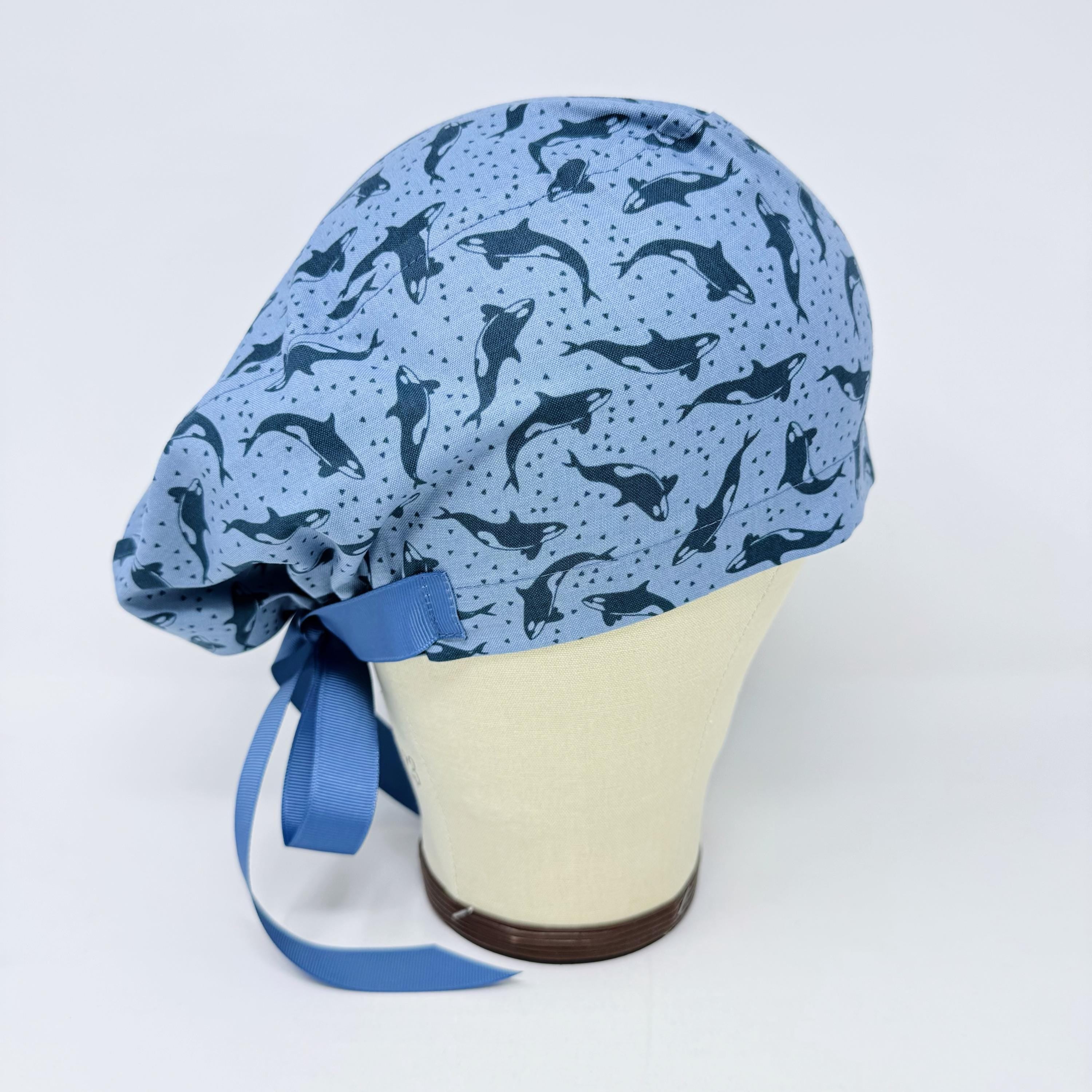 Ocean Orcas Euro scrub cap with ties for women. Blue Sea European satin lined surgical cap by Paradise Caps. Euro PLUS style.
