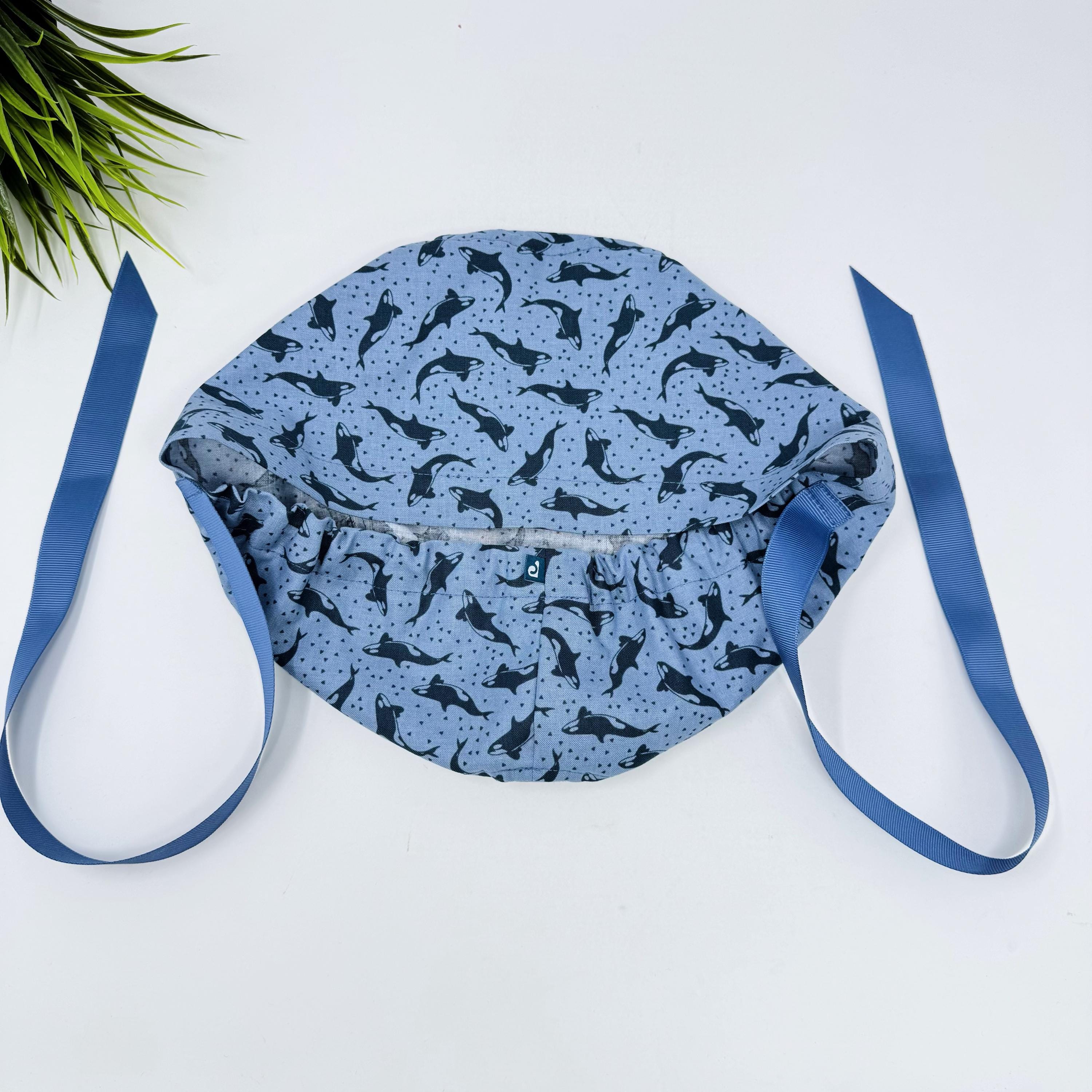 Ocean Orcas Euro scrub cap with ties for women. Blue Sea European satin lined surgical cap by Paradise Caps. Euro PLUS style.