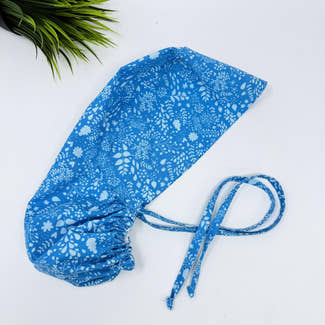 Calm Blue Ponytail scrub cap for women with satin lined option by Paradise Caps.