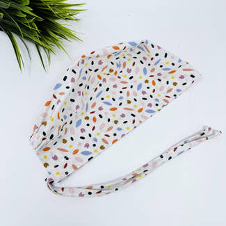Spring Petals Skull tie-back style surgical scrub cap by Paradise Caps.