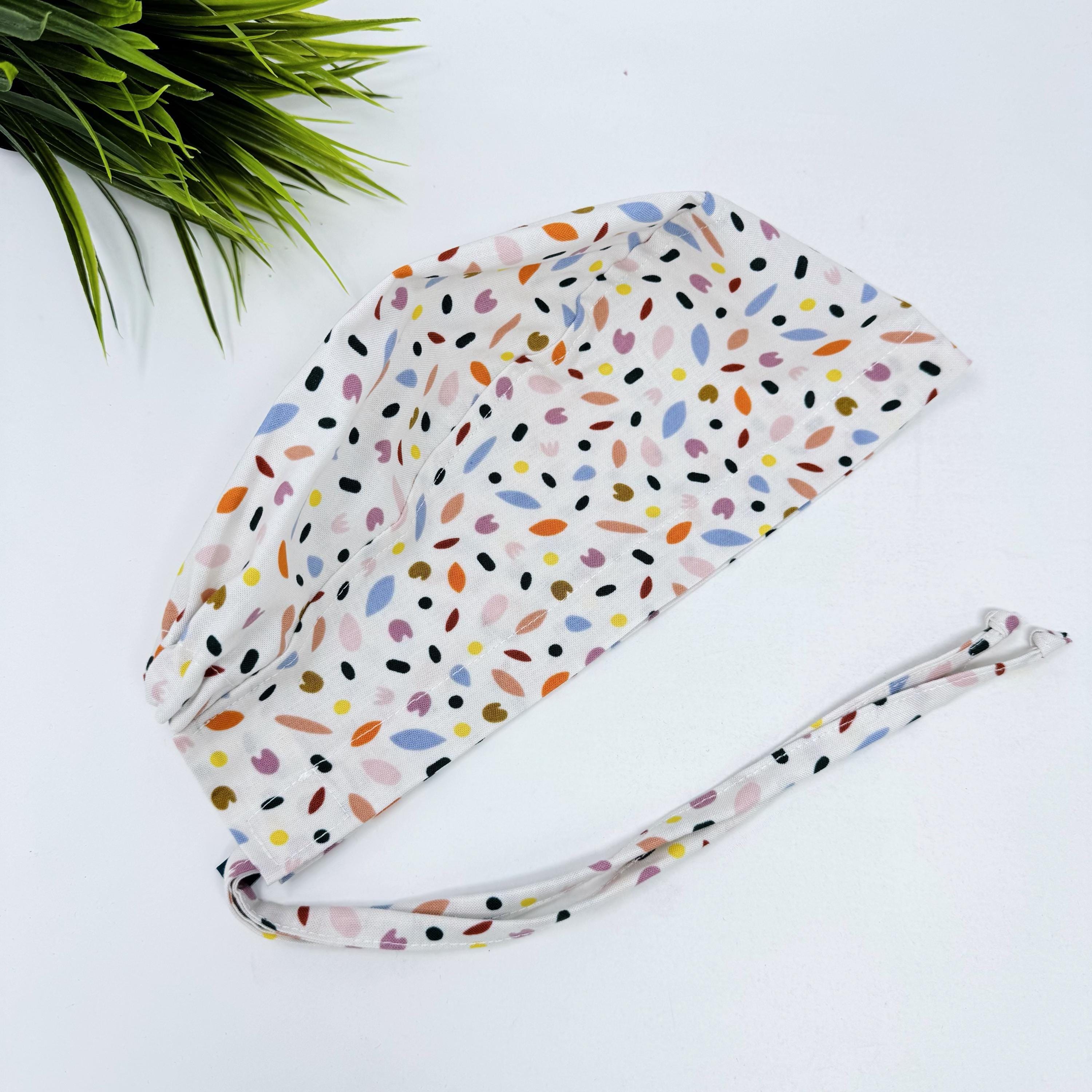 Spring Petals Skull tie-back style surgical scrub cap by Paradise Caps.
