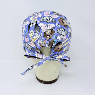 Men's surgical scrub cap. Easter Bunny & Puppy skull tie-back style scrub cap by Paradise Caps.