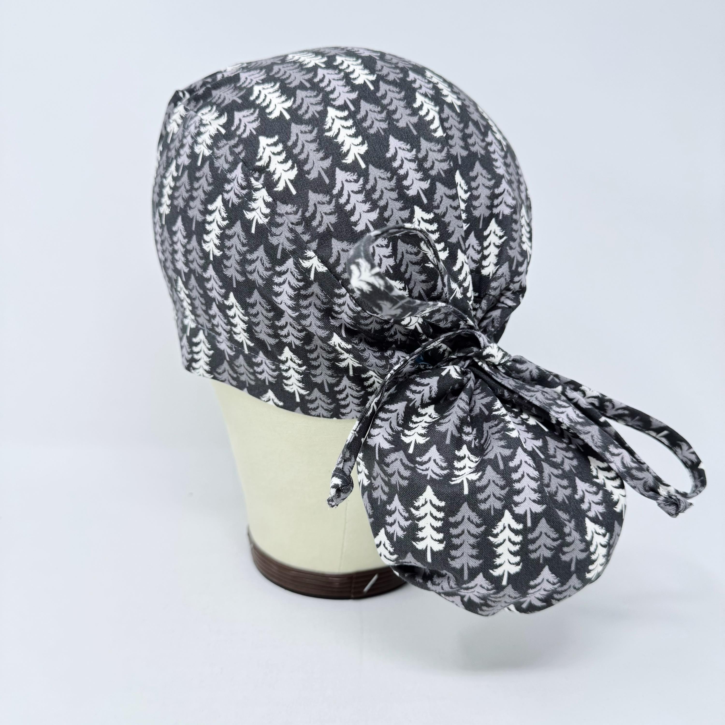 Ponytail scrub cap for women with satin lined option. Nordic Pines Surgical hat with ponytail by Paradise Caps.