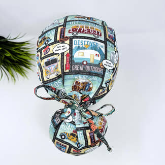 Ponytail scrub cap for women. Route 66 Satin Lined Surgical hat with ponytail by Paradise Caps.