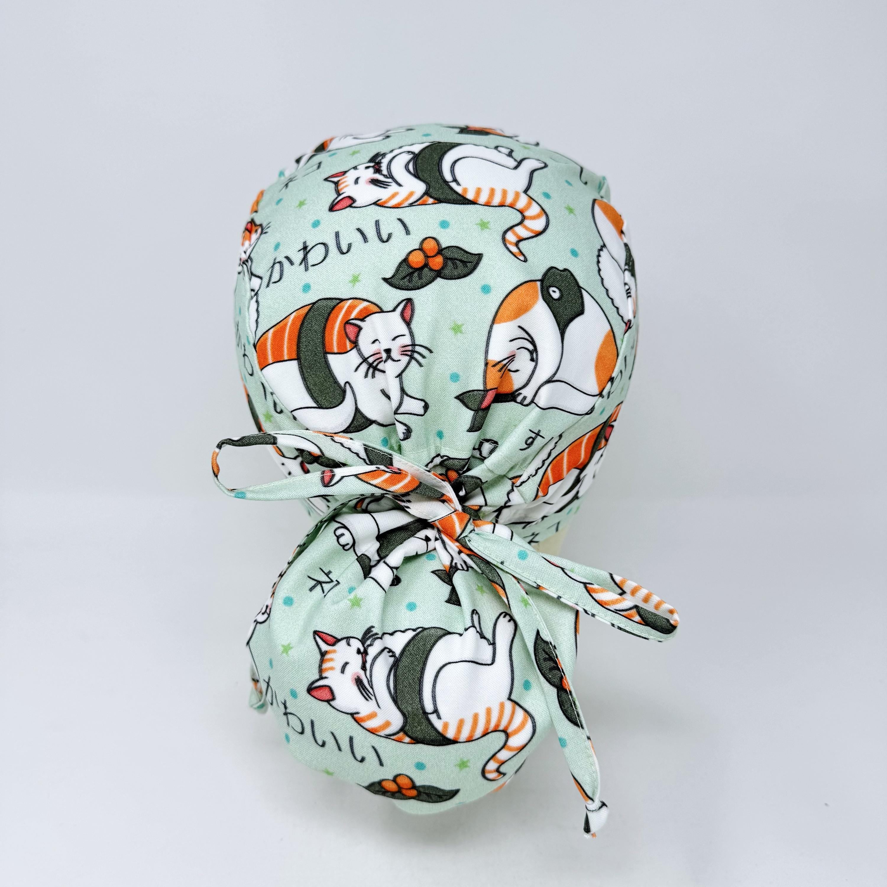 Cat Ponytail scrub cap for women by Paradise Caps. Satin lined Option surgical hat with ponytail.