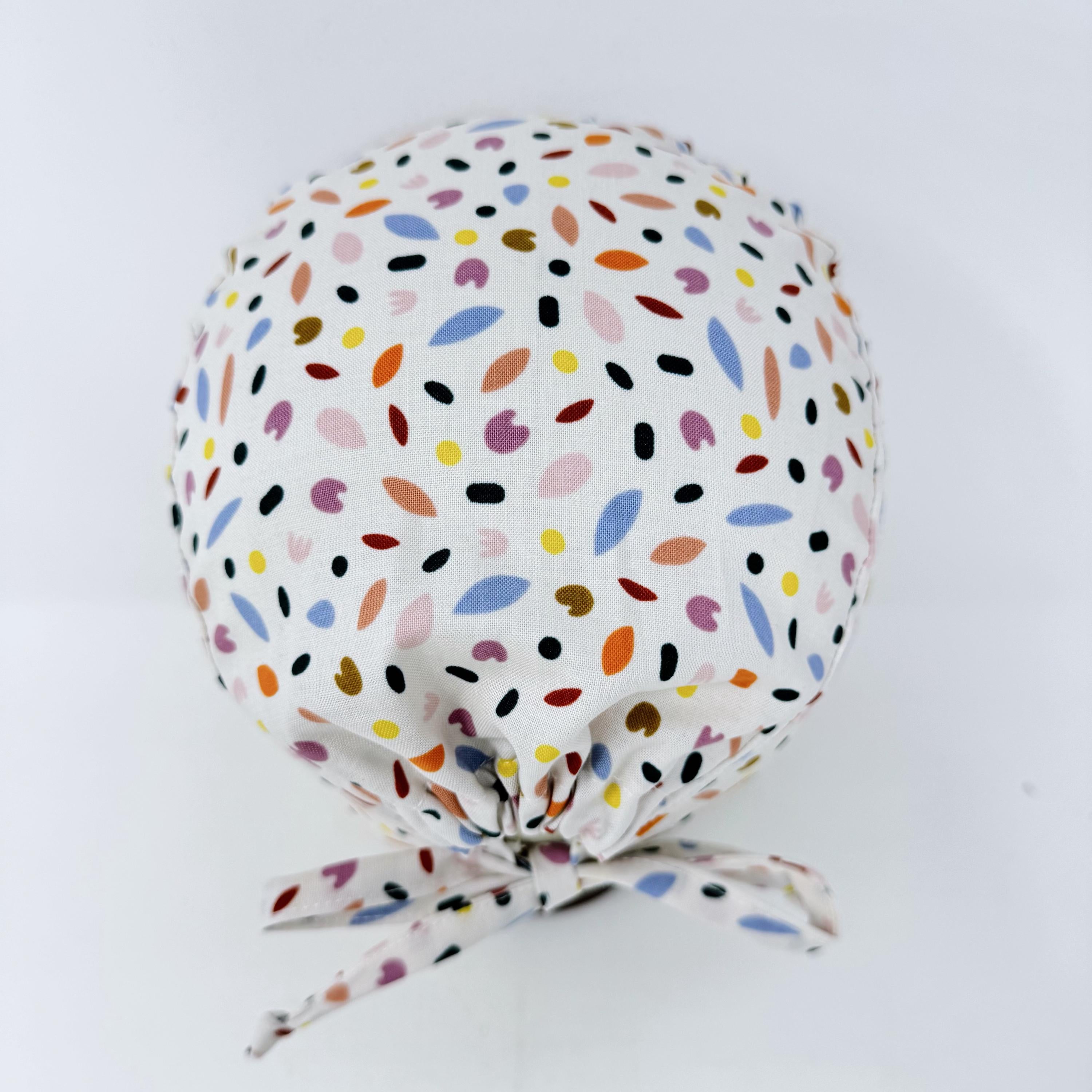 Spring Petals Skull tie-back style surgical scrub cap by Paradise Caps.