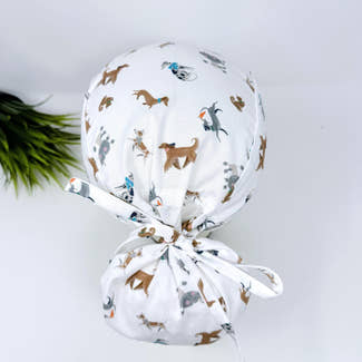 Ponytail scrub cap by Paradise Caps. Funny dogs Surgical hat for women with satin lined option.